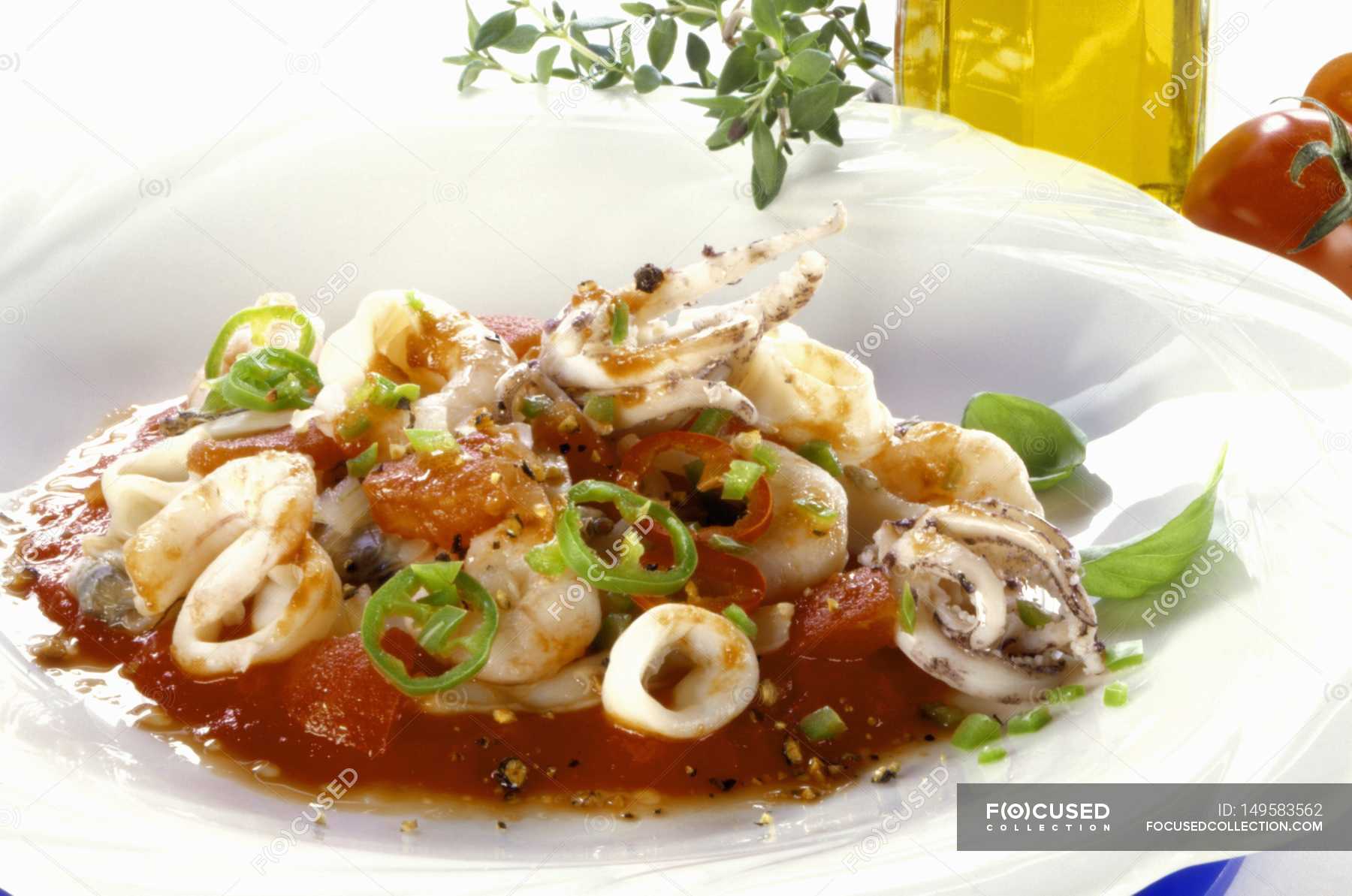 Squid in tomato sauce — eat, dish - Stock Photo | #149583562