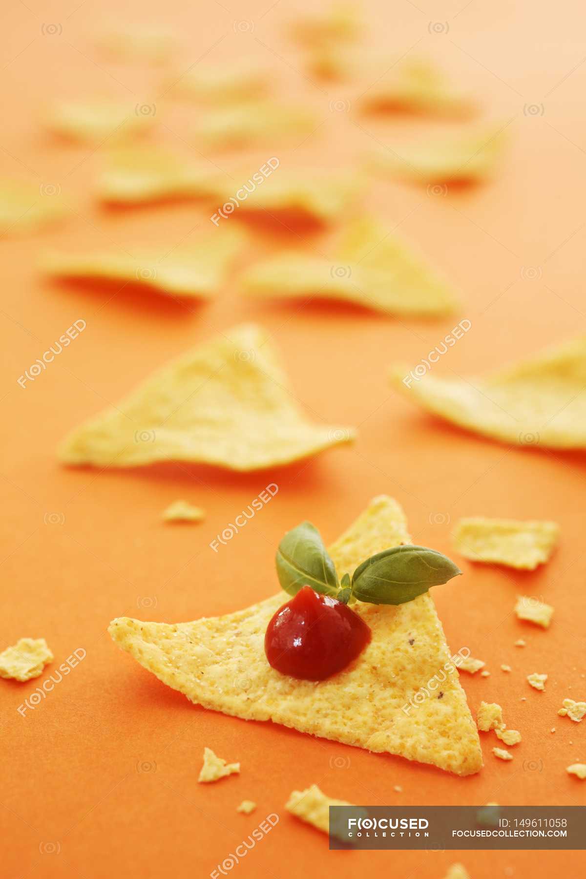 Tacos with ketchup and basil — delicious, surface Stock Photo 149611058