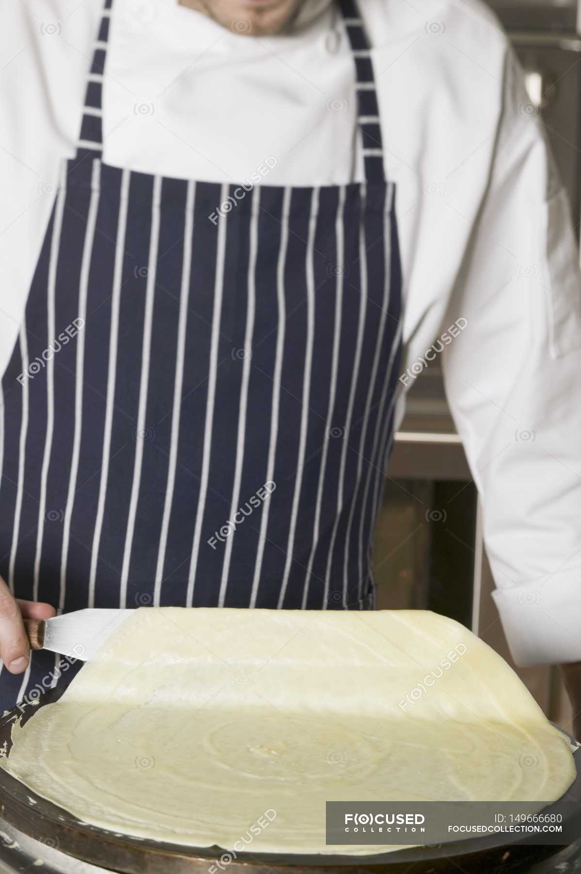 Cropped view of chef making a crepe — Color Image, delicious Stock