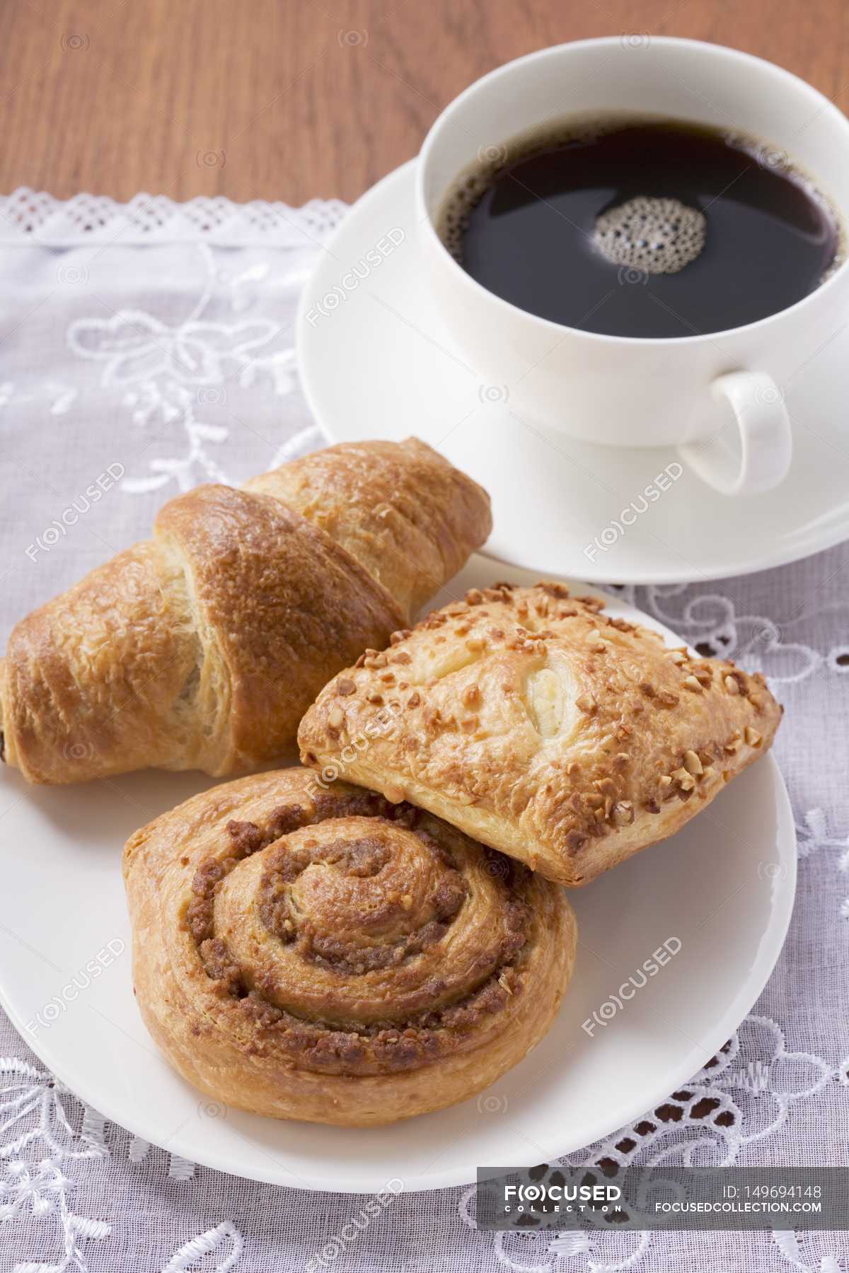 Sweet Pastries And Cup Of Coffee Cookery Buns Stock Photo