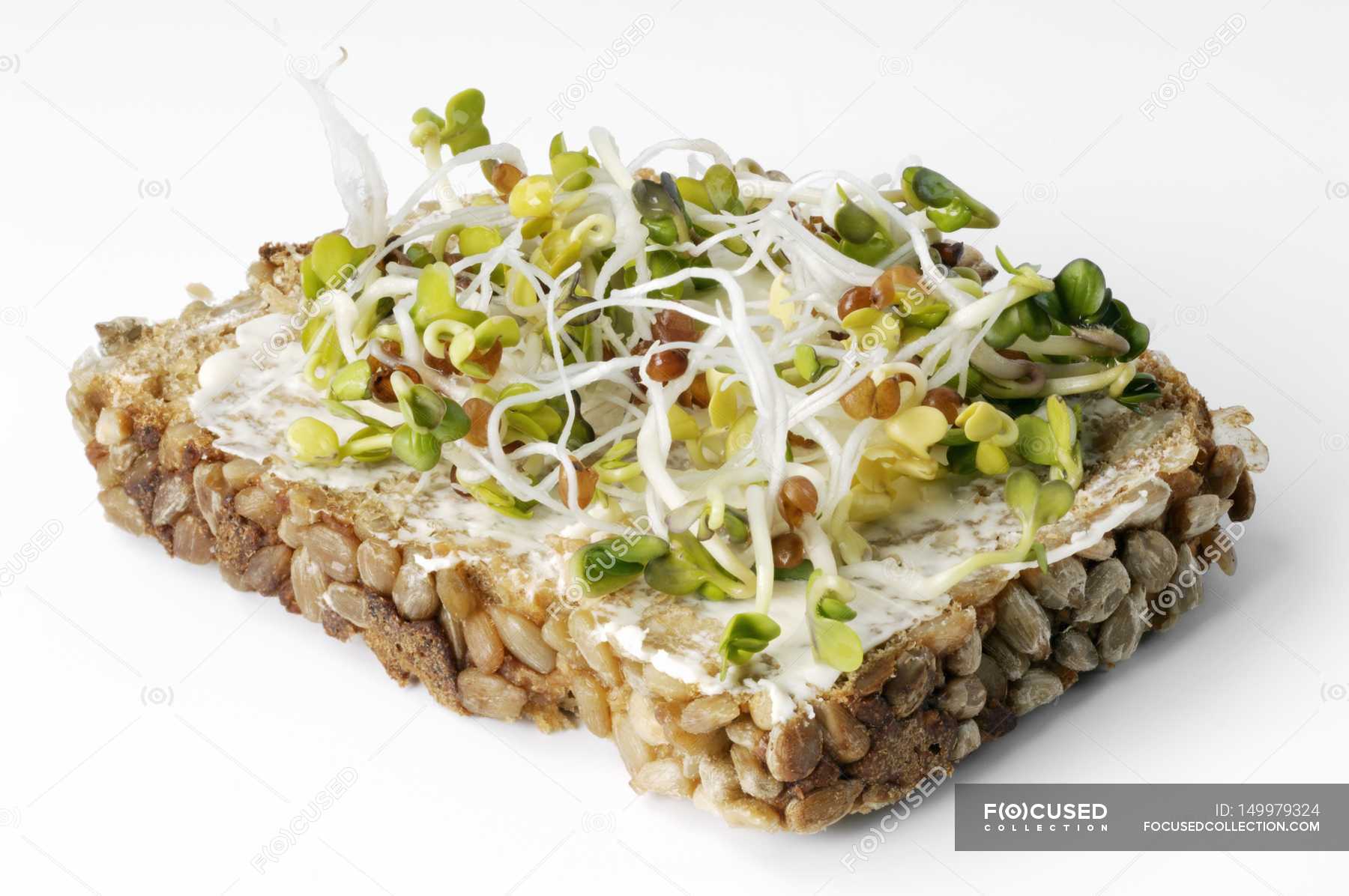 Radish sprouts on bread — color, product Stock Photo 149979324