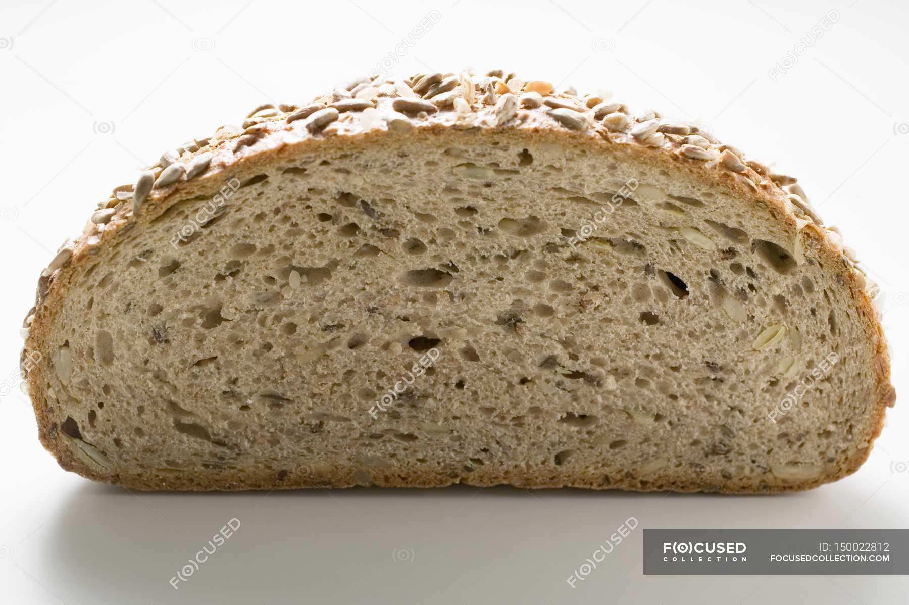 Half a loaf of sunflower bread — sunflower seeds, kernel Stock Photo
