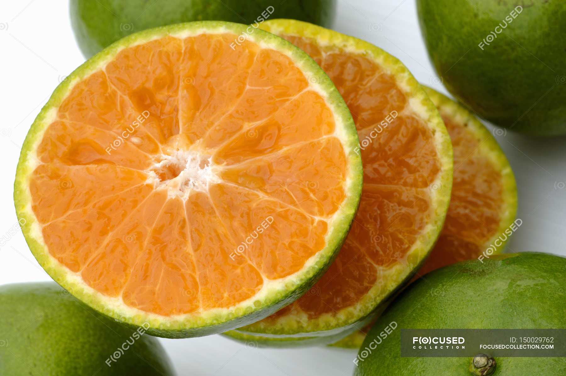 Sliced green tangerine — Healthy Eating, raw food Stock Photo