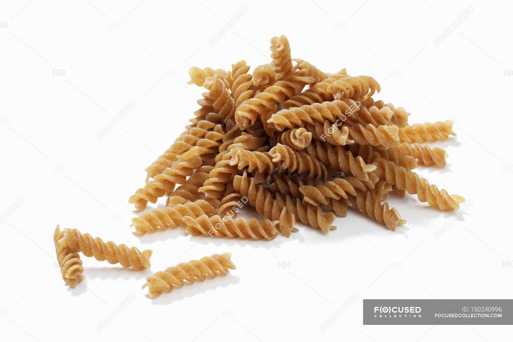 Download Wholemeal Fusilli Pasta Staple Food Tasty Stock Photo 150240996 Yellowimages Mockups