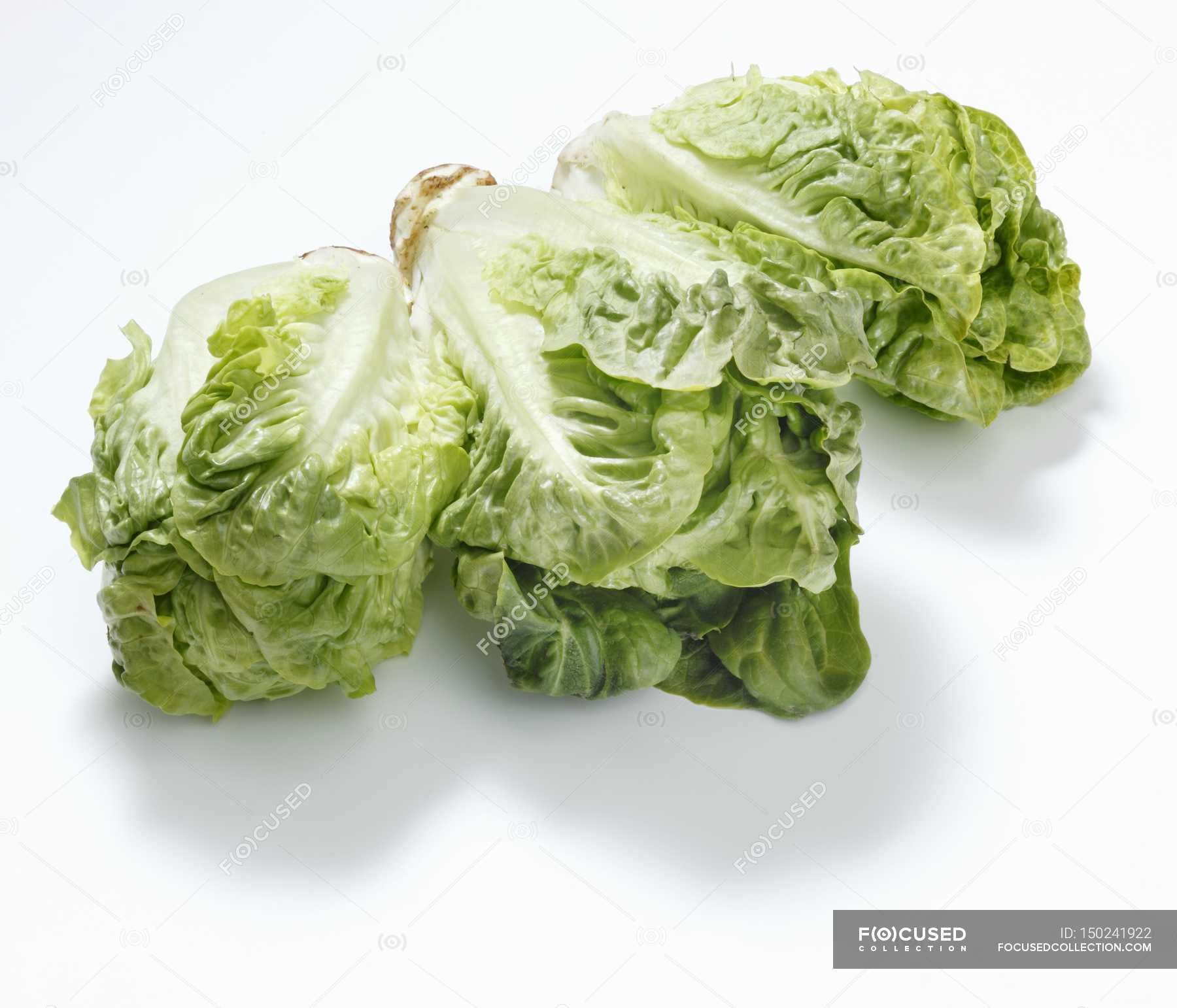 Three green lettuce hearts — nutrition, vegetarian Stock Photo
