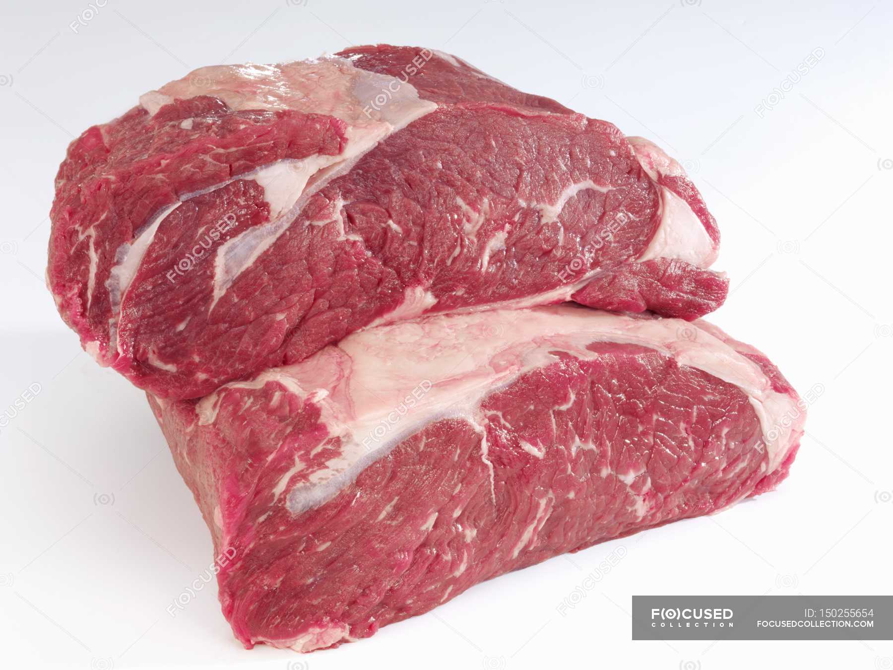 Stacked Fresh pieces of beef — lifestyle, raw Stock Photo 150255654