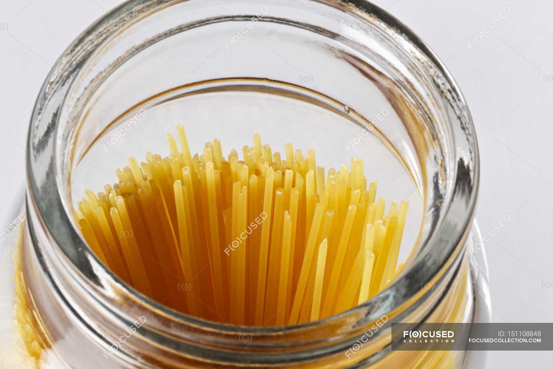 Dried spaghetti in jar — ingredients, cookery Stock Photo 151108848