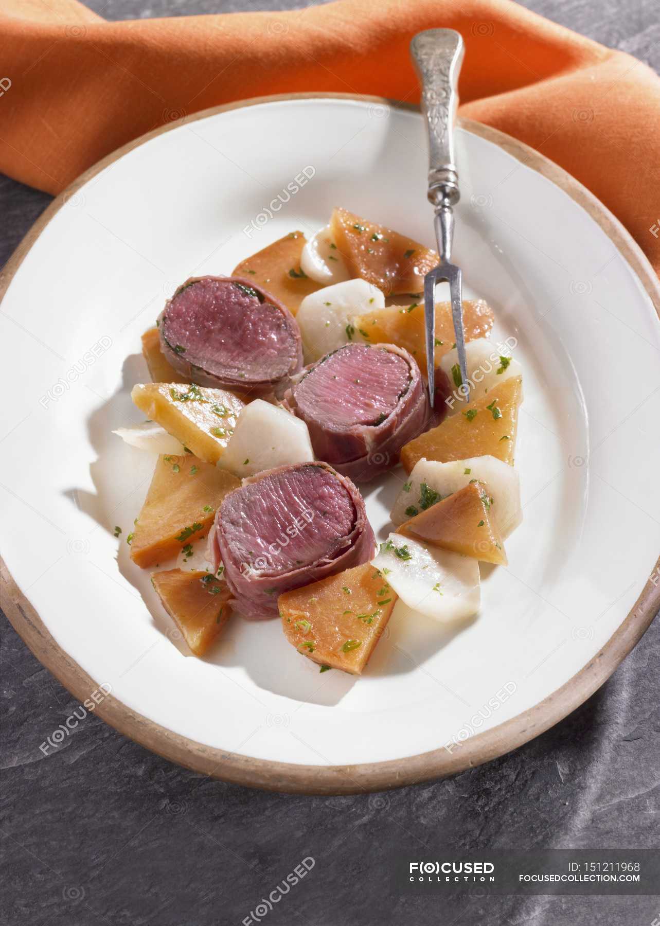 Saddle of lamb in bacon — restaurant, calorie Stock Photo 151211968