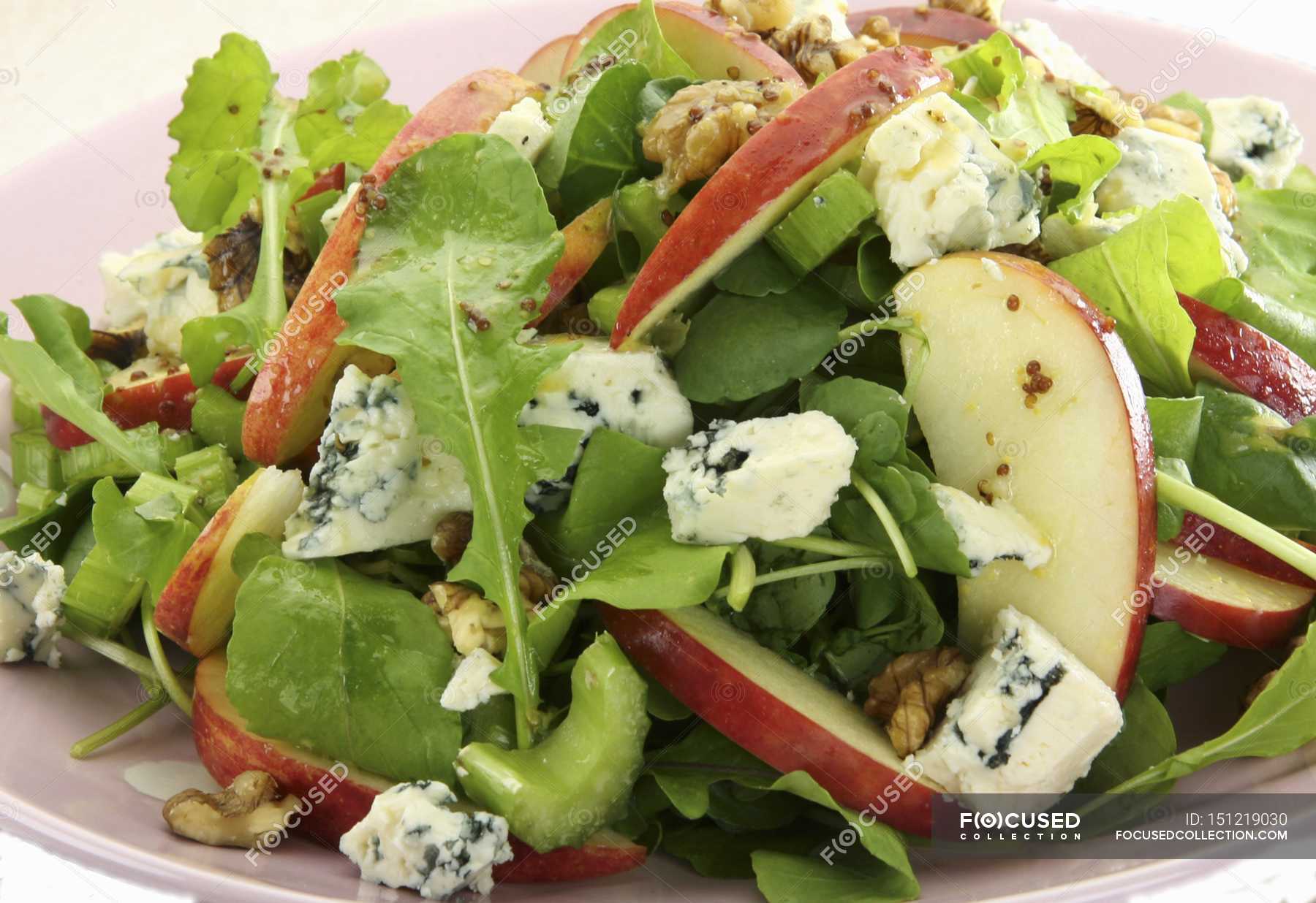 Mixed leaf salad — shape, Nutshell Stock Photo 151219030