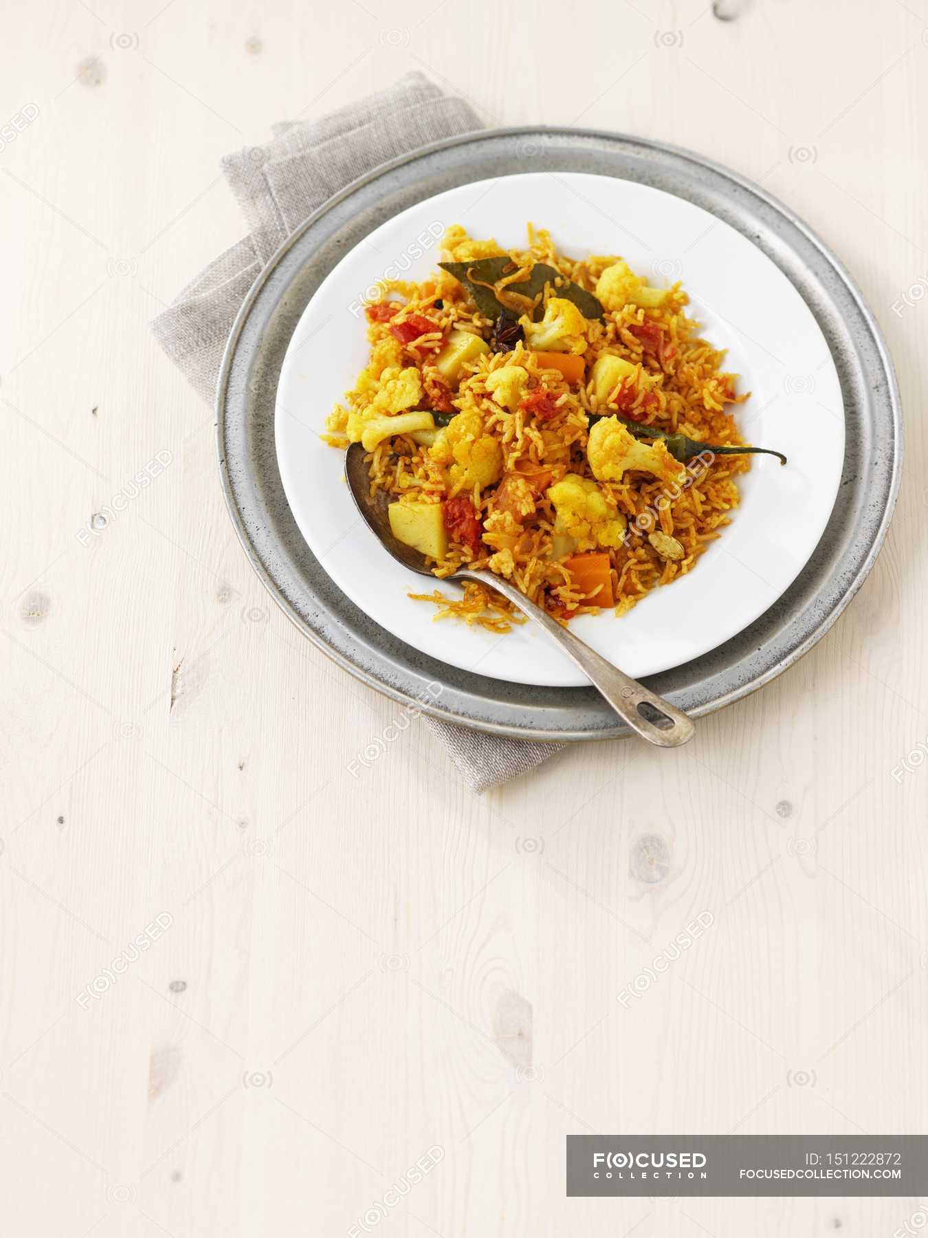 Saffron rice with vegetables — food, background Stock Photo 151222872