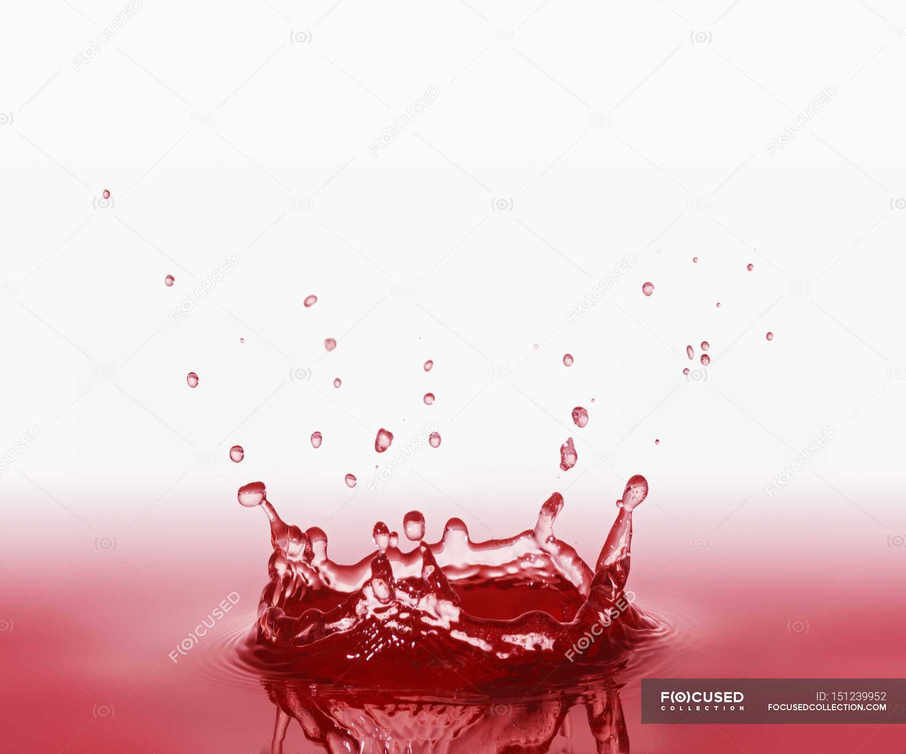 Splash of red juice — fresh, lifestyle - Stock Photo | #151239952