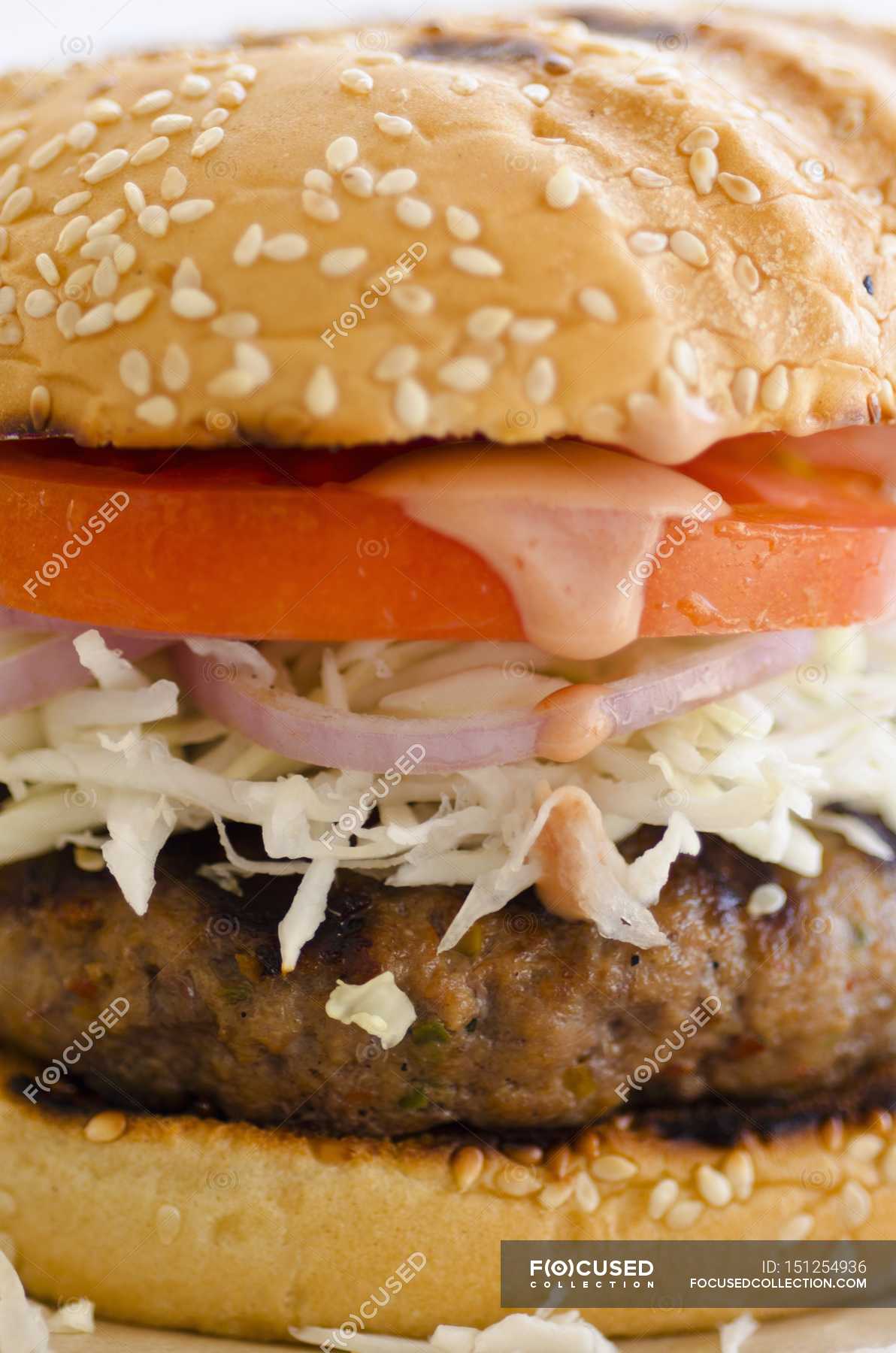Burger with shredded white cabbage — ingredients, cooked Stock Photo