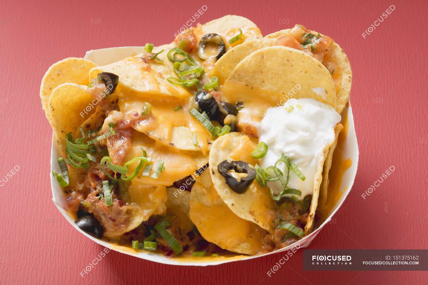 tortilla chips with meat and cheese