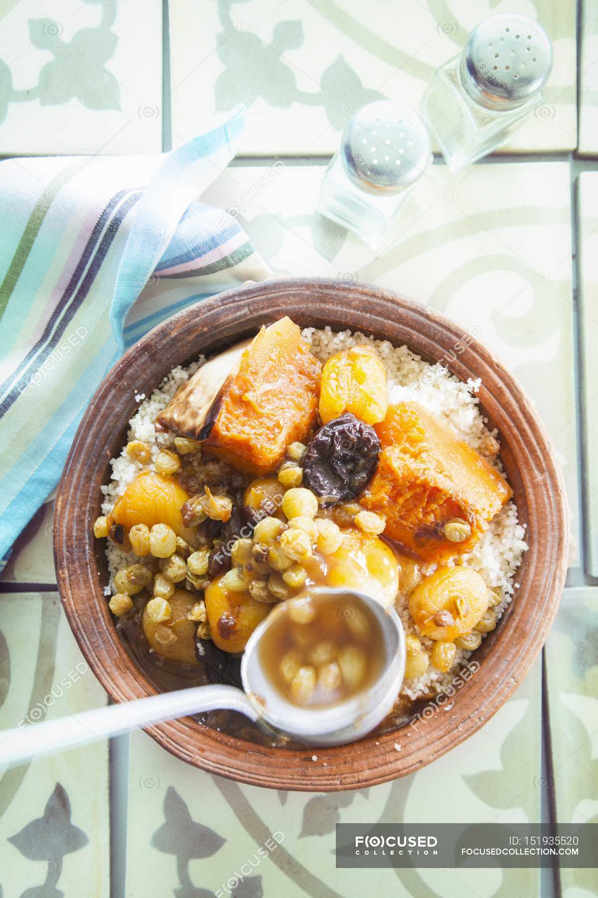 Sweet couscous with dried fruit — kernel, serving Stock Photo