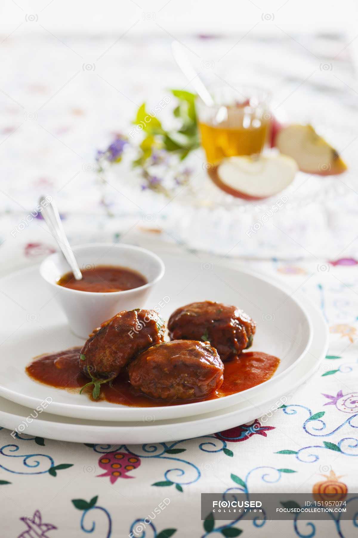 Fish cakes with tomato sauce — yummy, recipe Stock Photo 151957074
