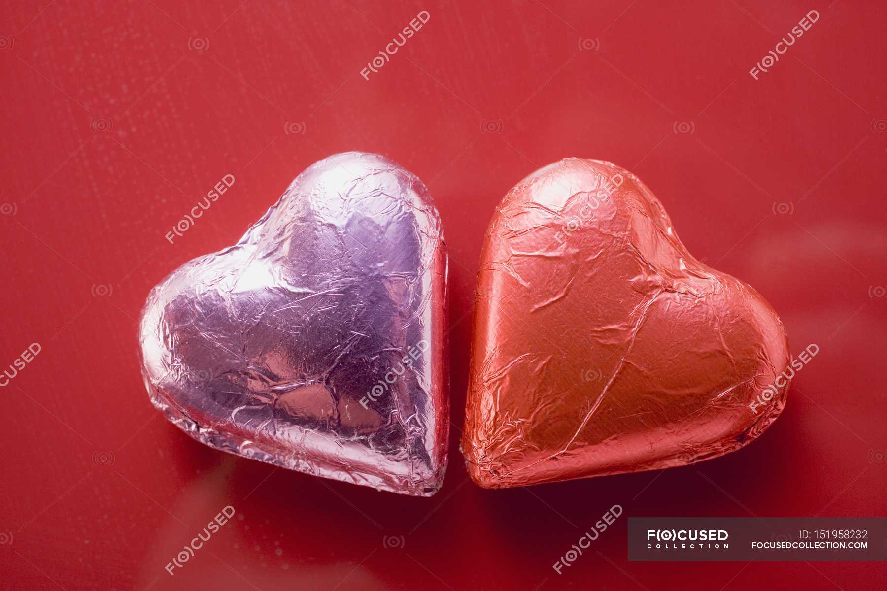 Cioccolatini in scatola a forma di cuore — buongustaio, appetito - Stock  Photo