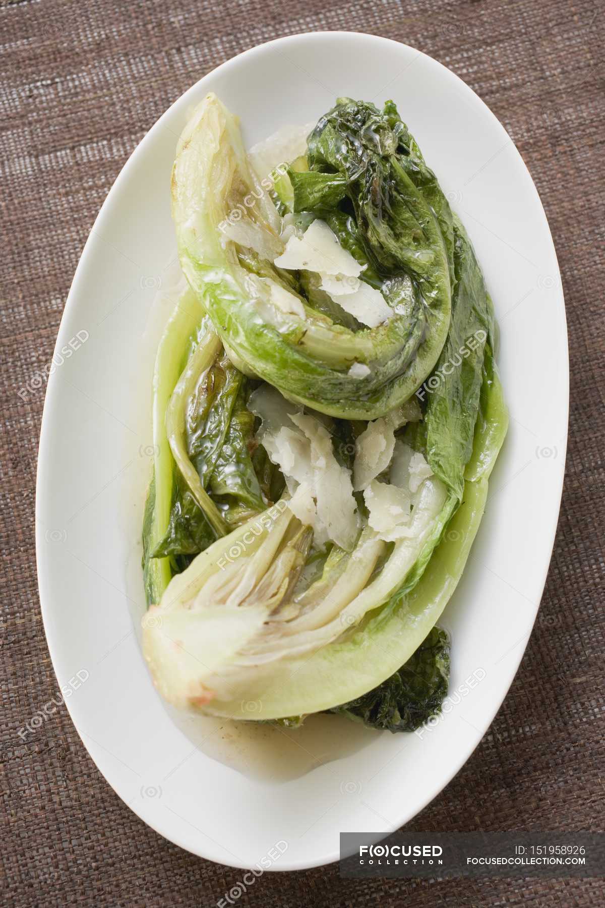 Braised romaine lettuce — weight, dish Stock Photo 151958926
