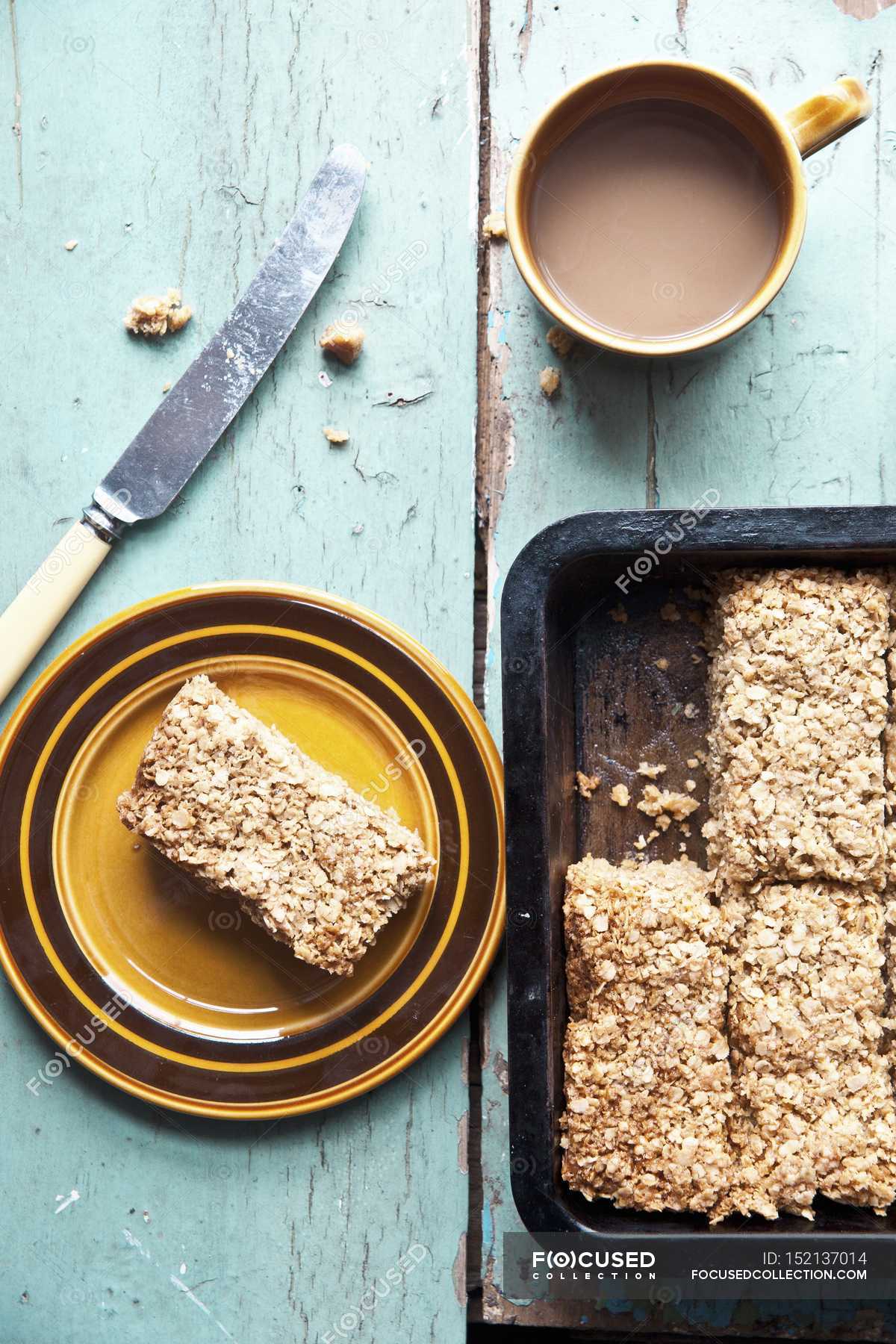 Homemade cereal flapjacks — tea, appetite Stock Photo 152137014