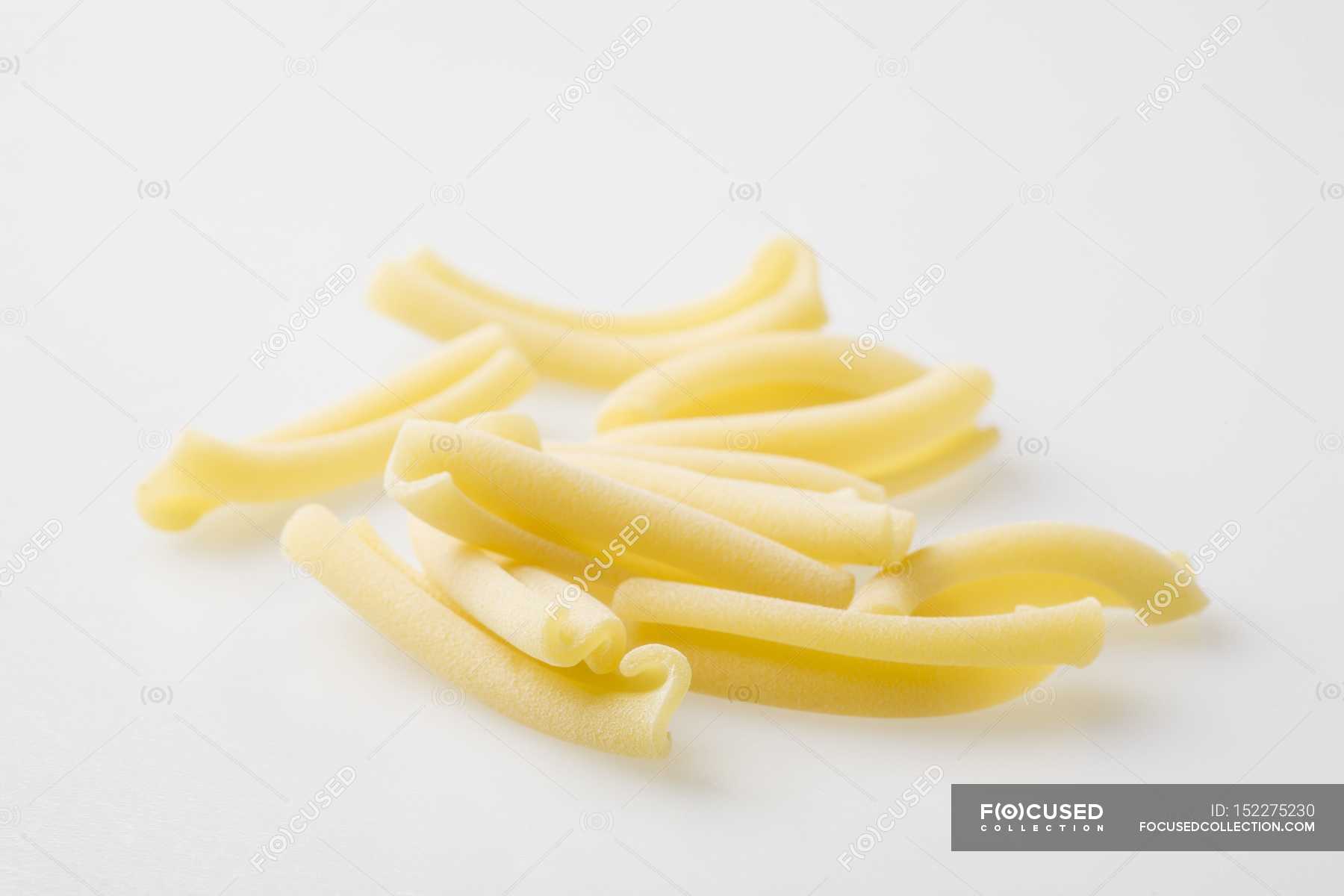 Fresh Casareccia pasta pieces — background, appetite - Stock Photo |  #152275230