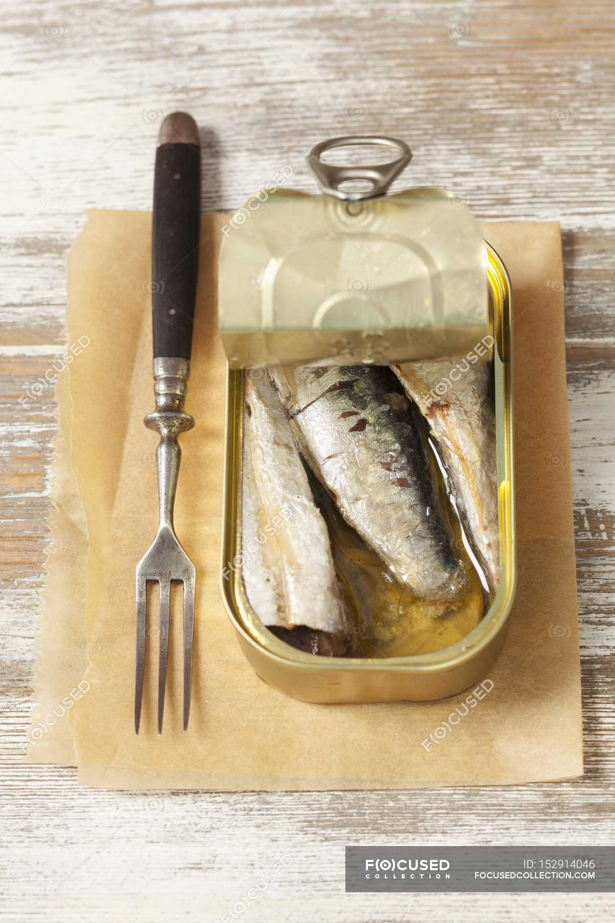 Tin of smoked sardines — shabby, close up Stock Photo 152914046