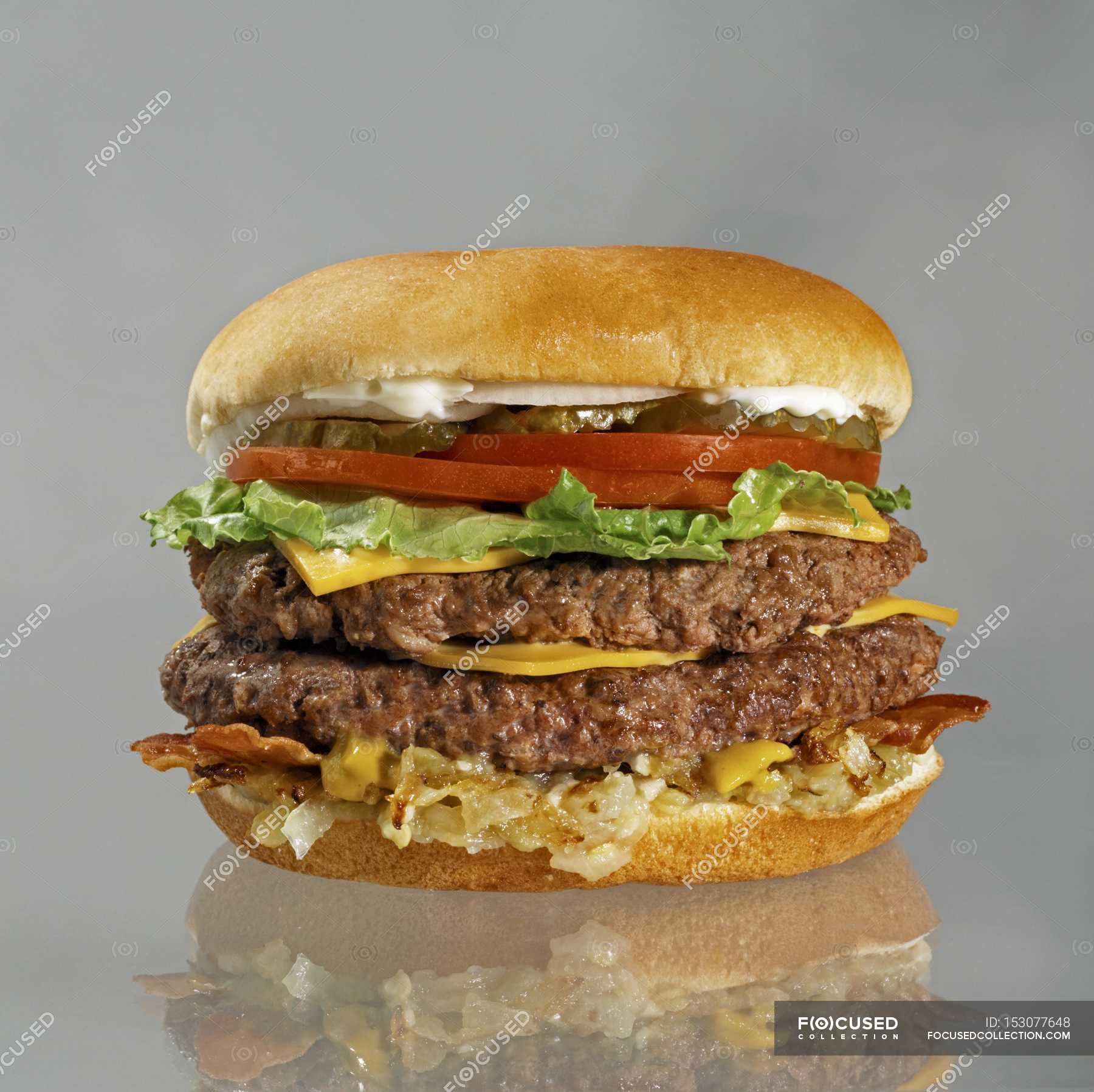 Double Cheeseburger with Bacon — crispy, lettuce - Stock Photo | #153077648