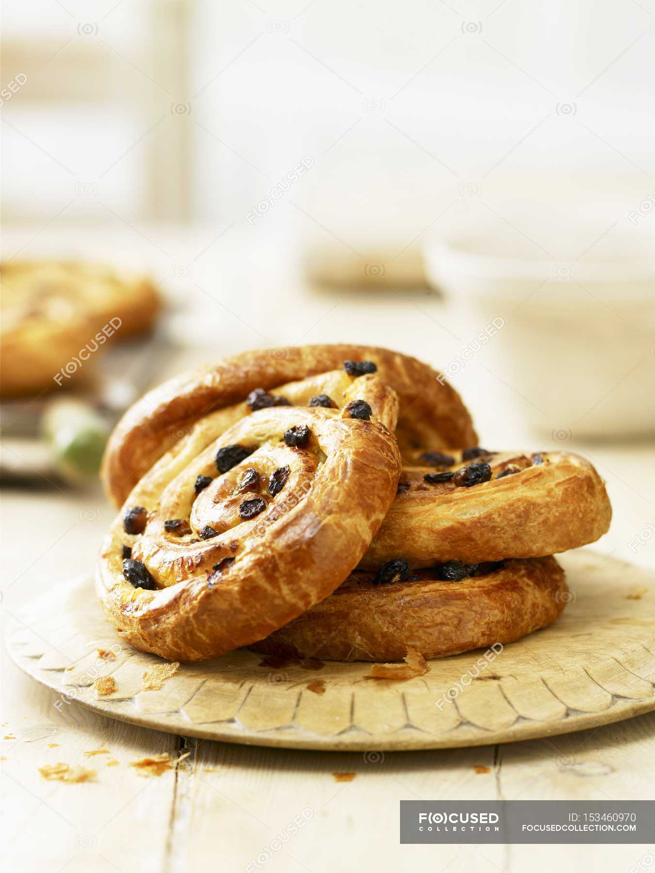 Baked Raisin whirls — pastries, recipe - Stock Photo | #153460970