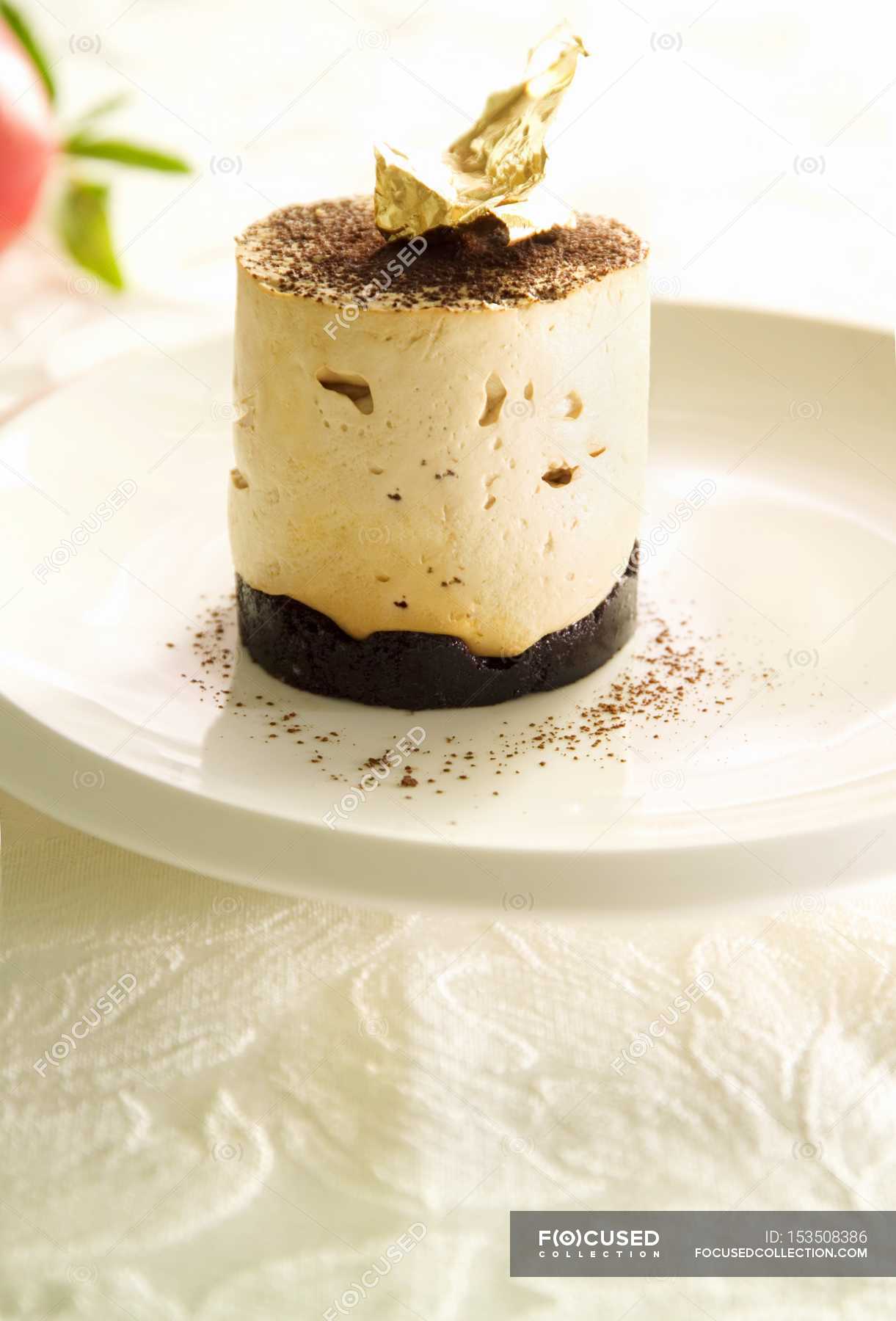 Quark mousse with chocolate and gold leaf — fresh, background Stock