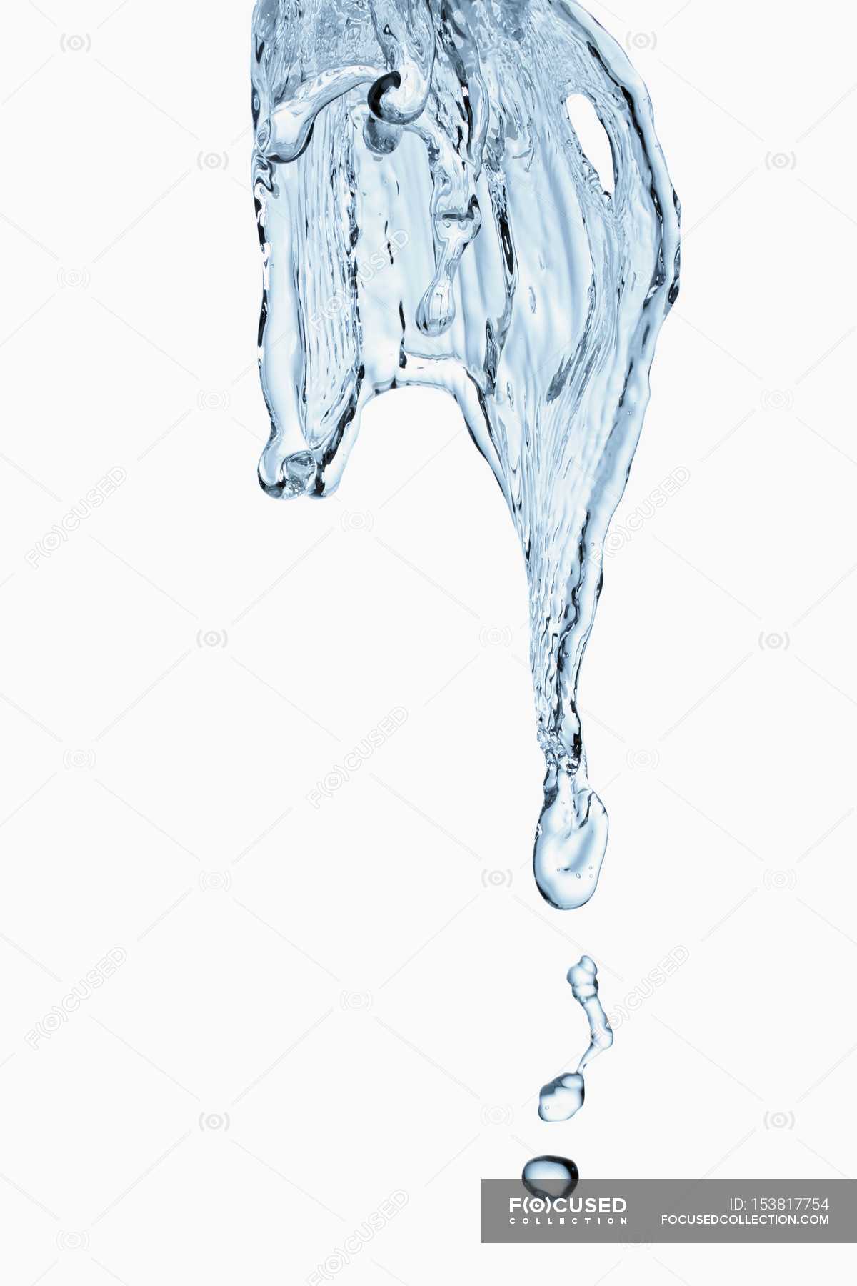 Closeup view of water flow and drops on white background — details, pouring  - Stock Photo | #153817754