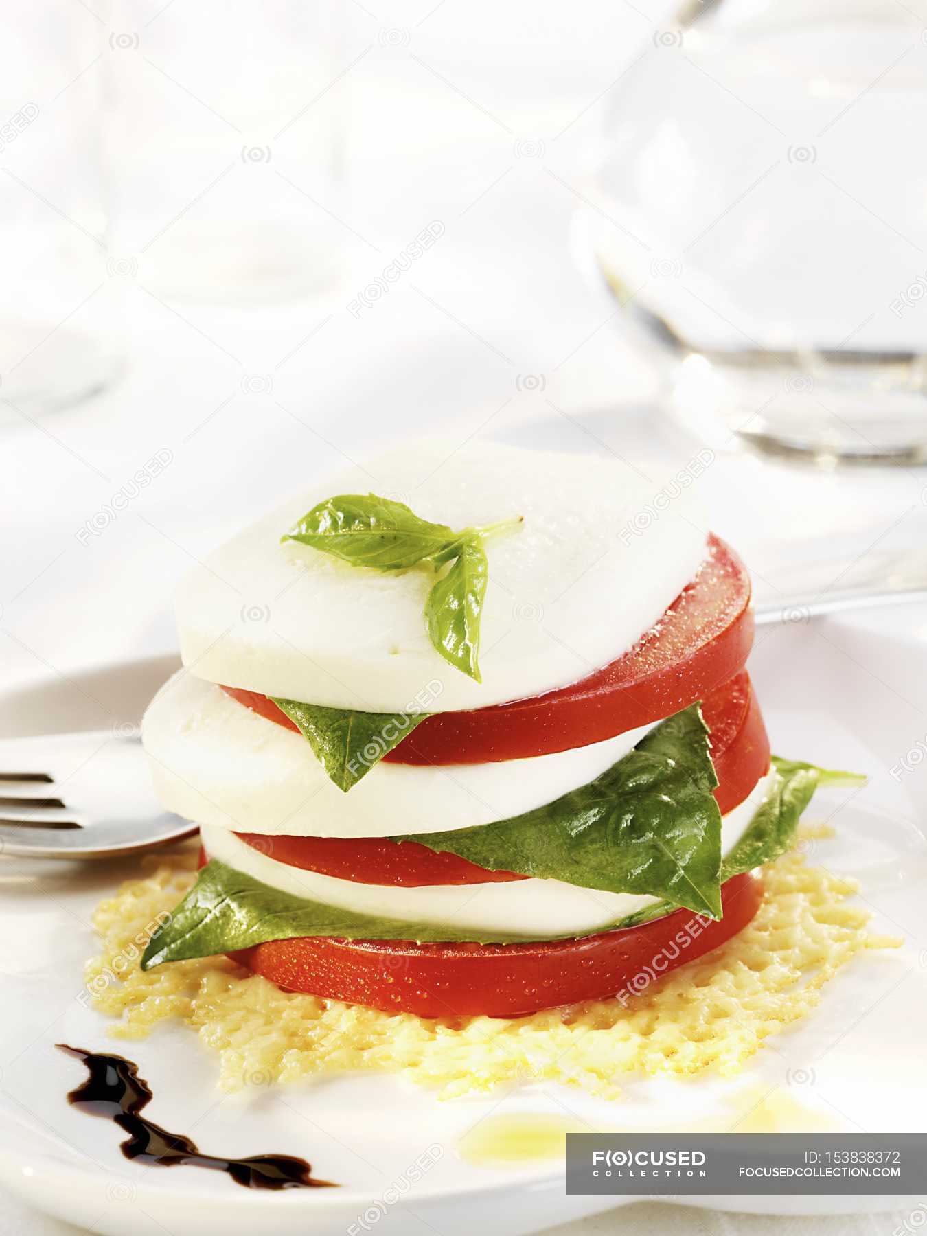 Stacked Tomato Mozzarella — recipe, calorie Stock Photo 153838372