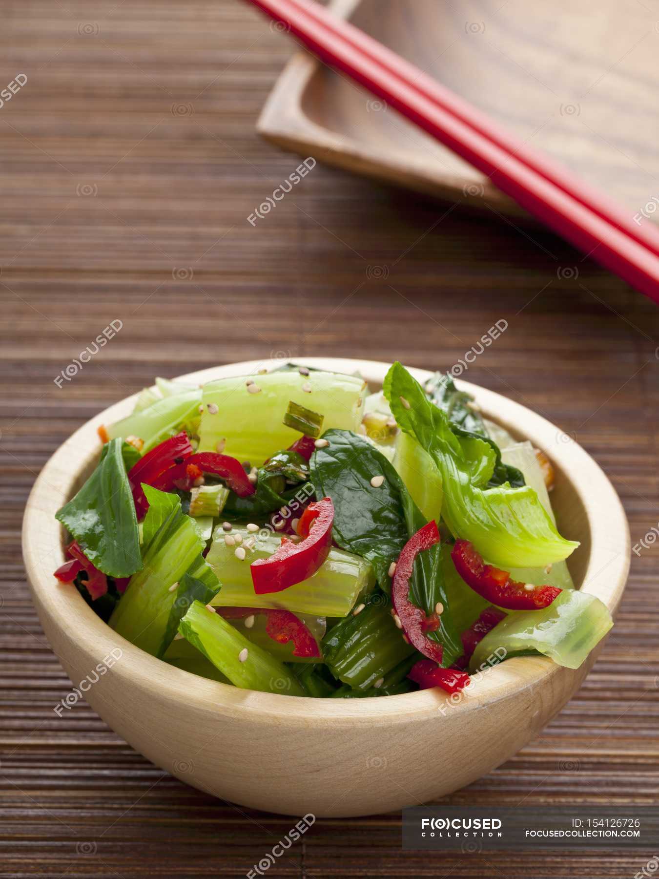 Baby pak choi with chillies and sesame — food, unprocessed - Stock ...