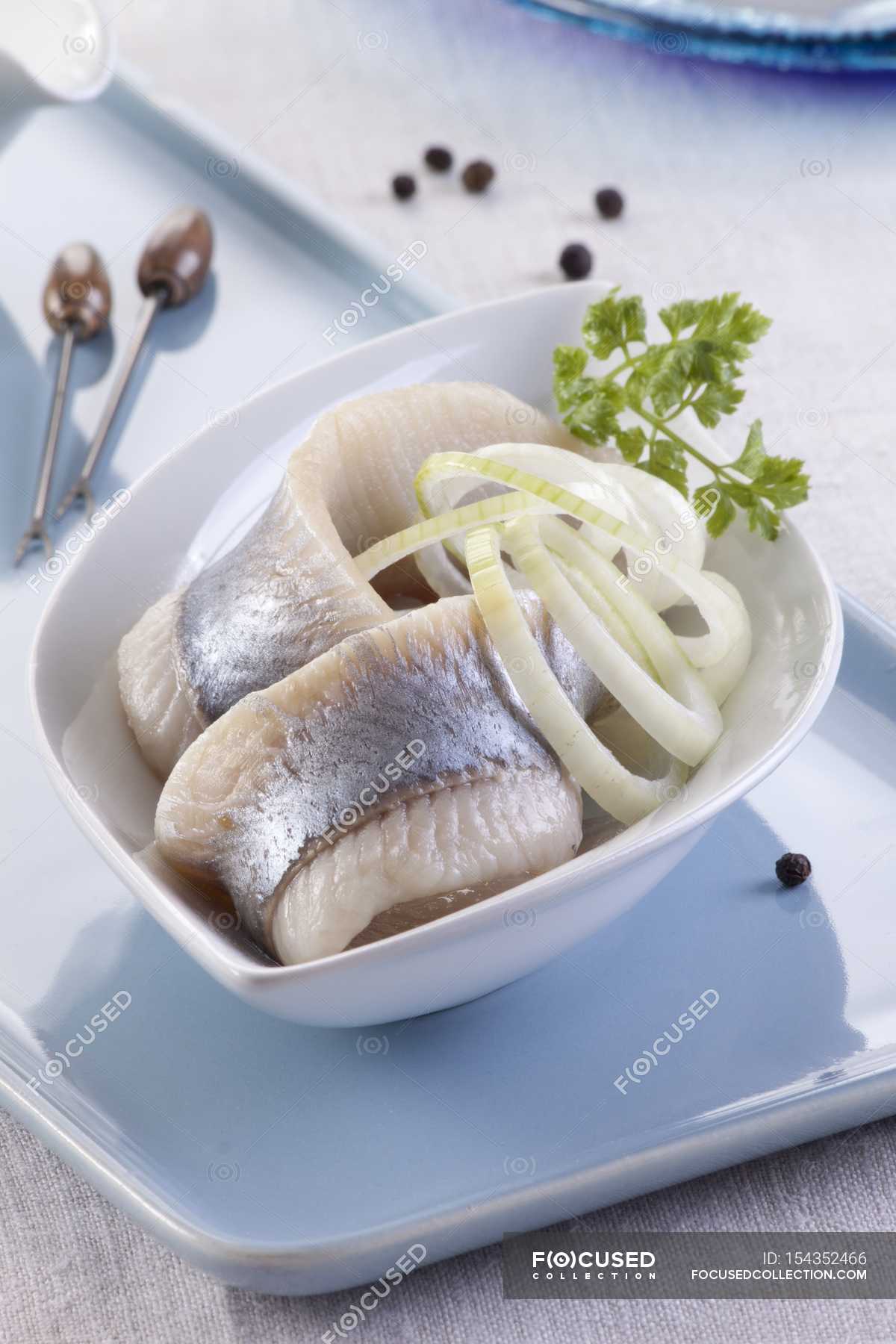 Herring fillets with onions — rare, lunch Stock Photo 154352466