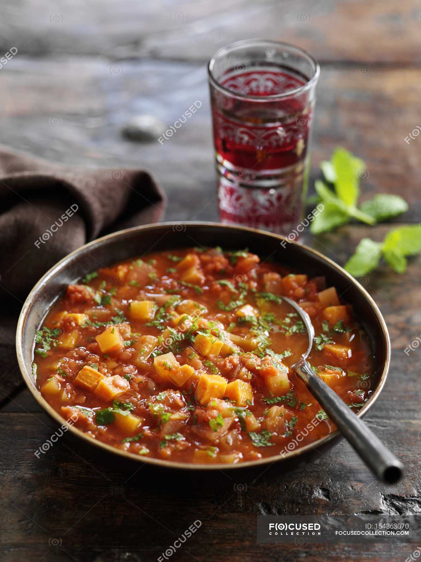 Indian Spicy red lentil soup — serving, delicious - Stock Photo