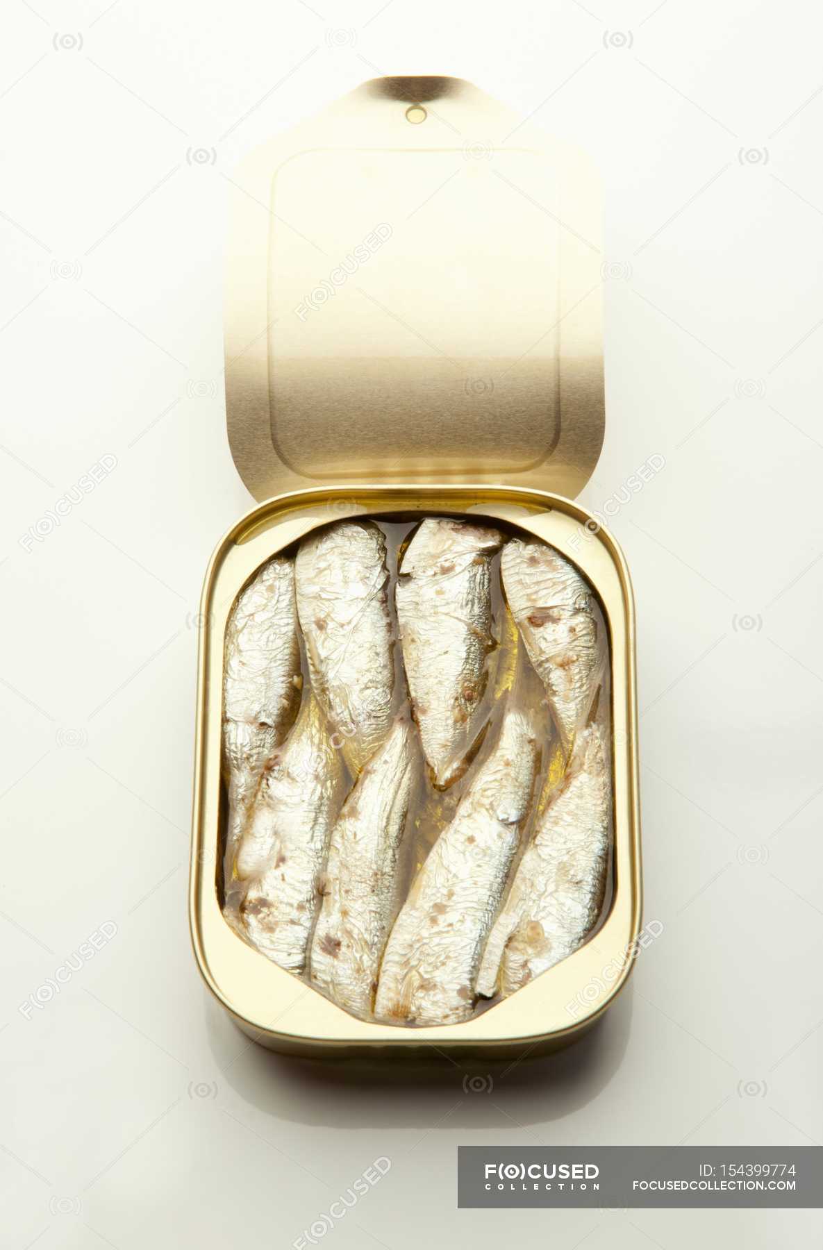 Opened tin of sardines — cuisine, cooked Stock Photo 154399774