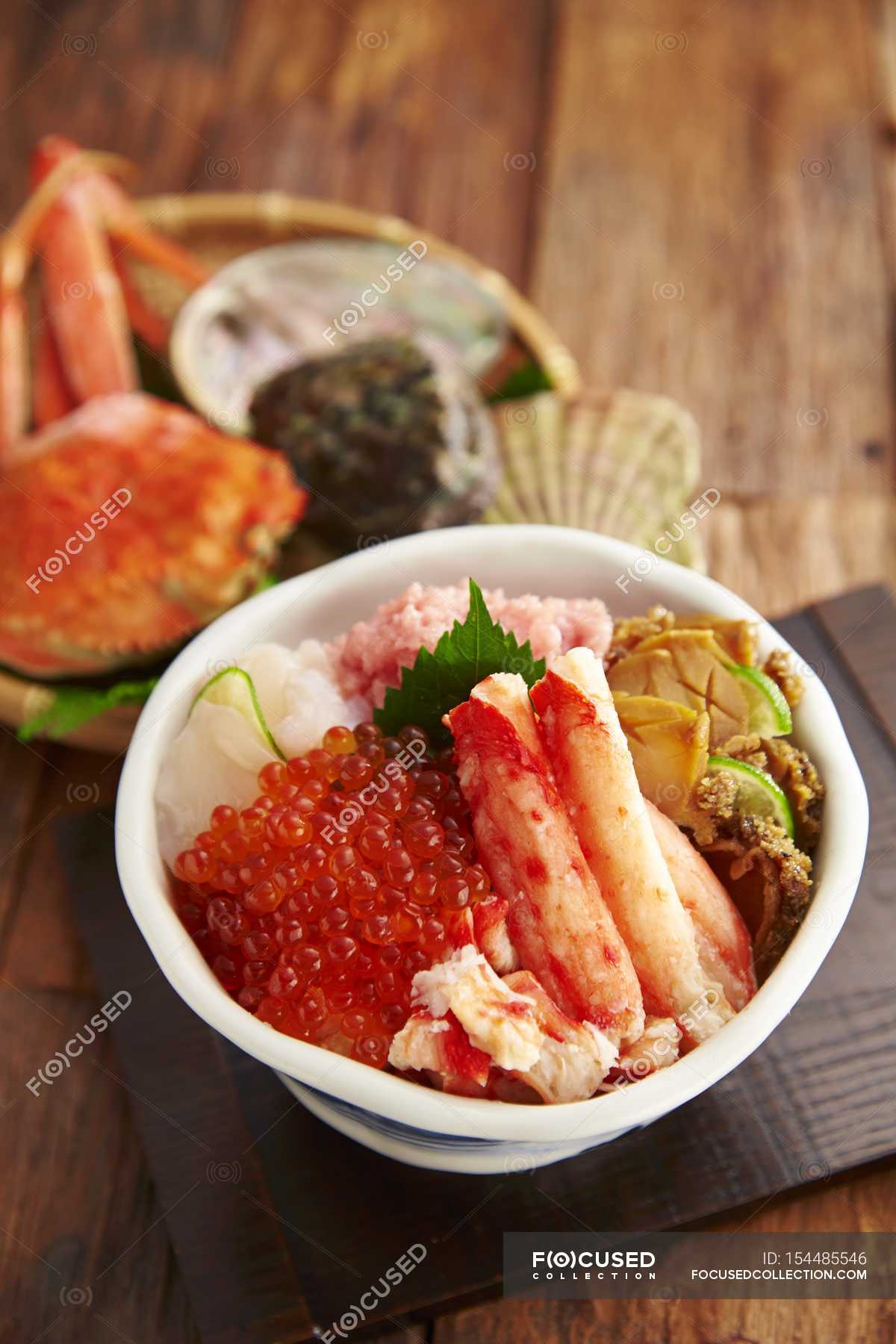 Closeup view of seafood with chum salmon caviar in bowl — nutritious ...