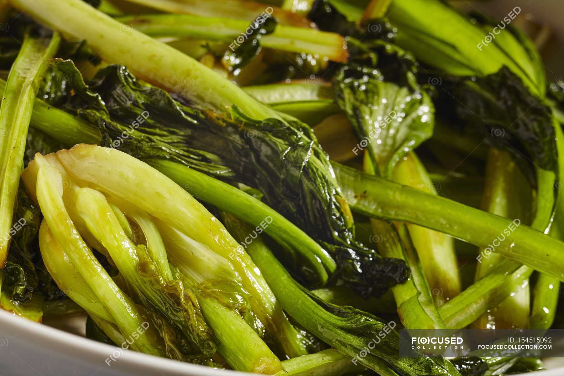 flash-fried-tatsoi-in-white-bowl-delicious-flash-fried-stock-photo