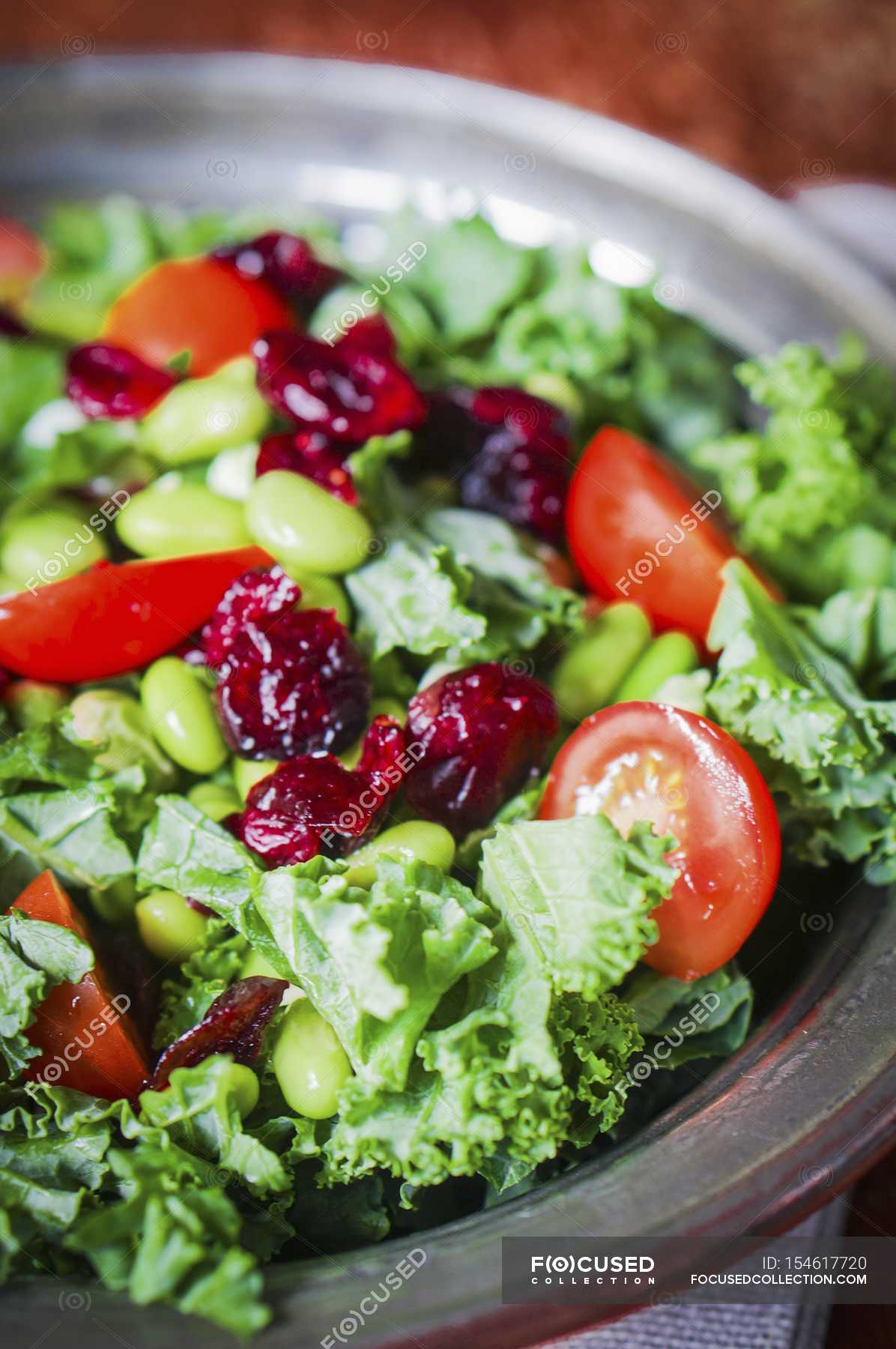 Mixed leaf salad — tomatoes, product Stock Photo 154617720