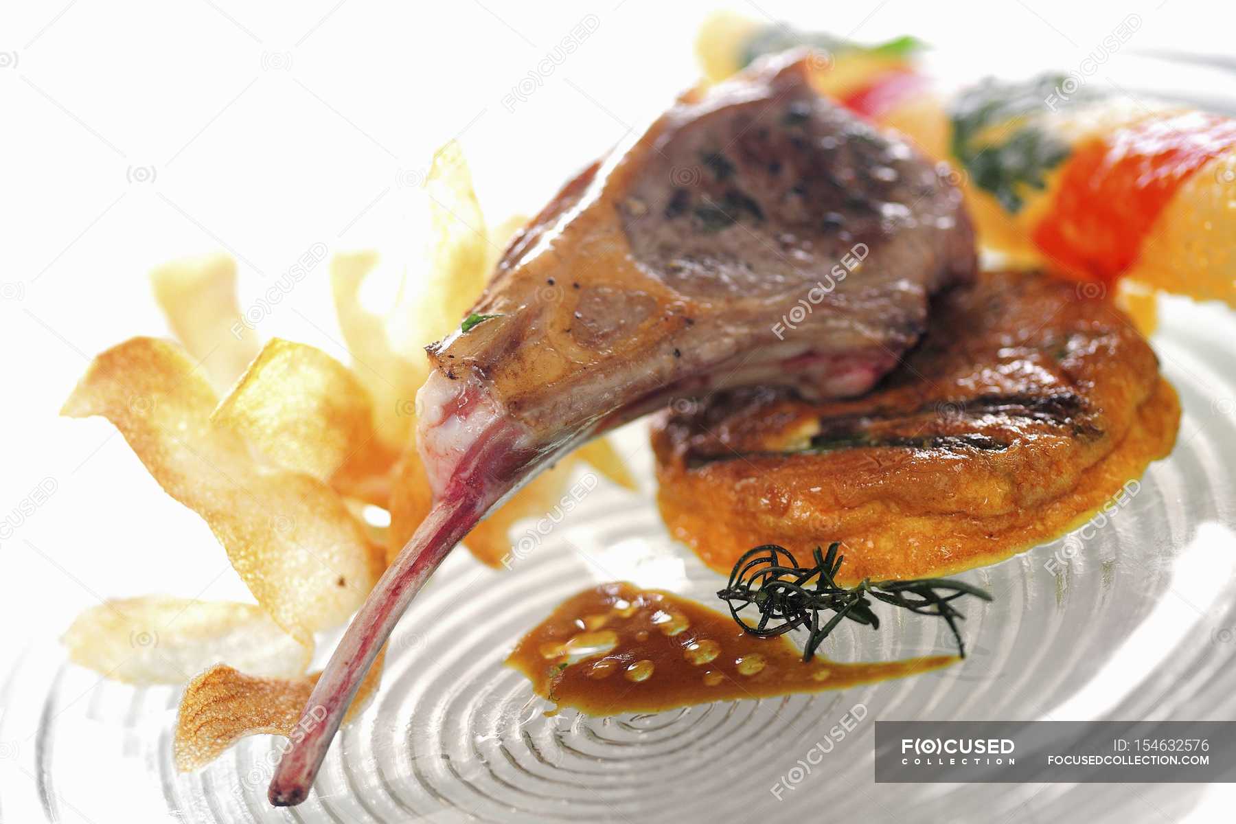 Lamb chop with sauce — entree, main dishes - Stock Photo | #154632576