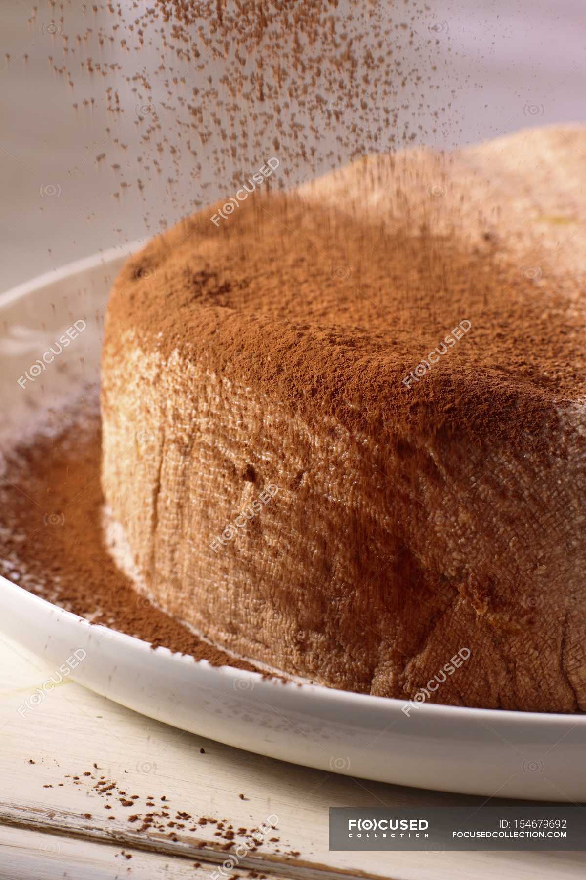 When baking a chocolate cake, grease your cake pans and dust them with cocoa  powder instead of flour. Prevents sticking, adds a chocolately layer, and  prevents any white floury patches. : r/foodhacks