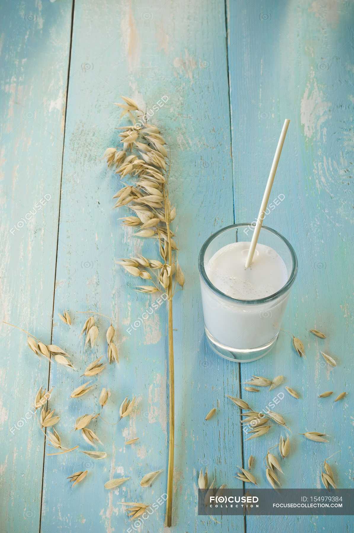 glass-of-oat-milk-cholesterol-portion-stock-photo-154979384