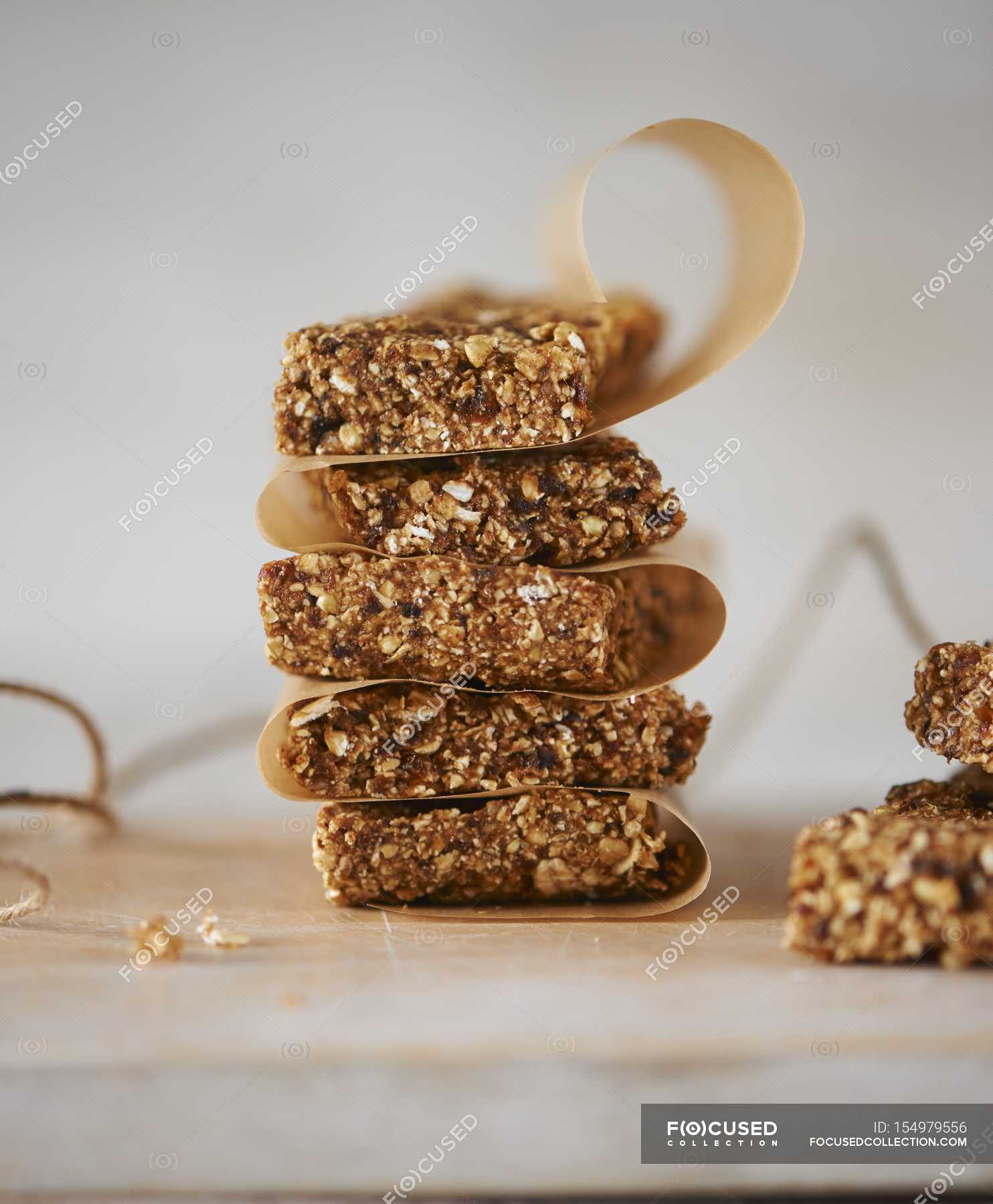 Stack of flapjacks muesli bars — flakes, cuisine Stock Photo 154979556