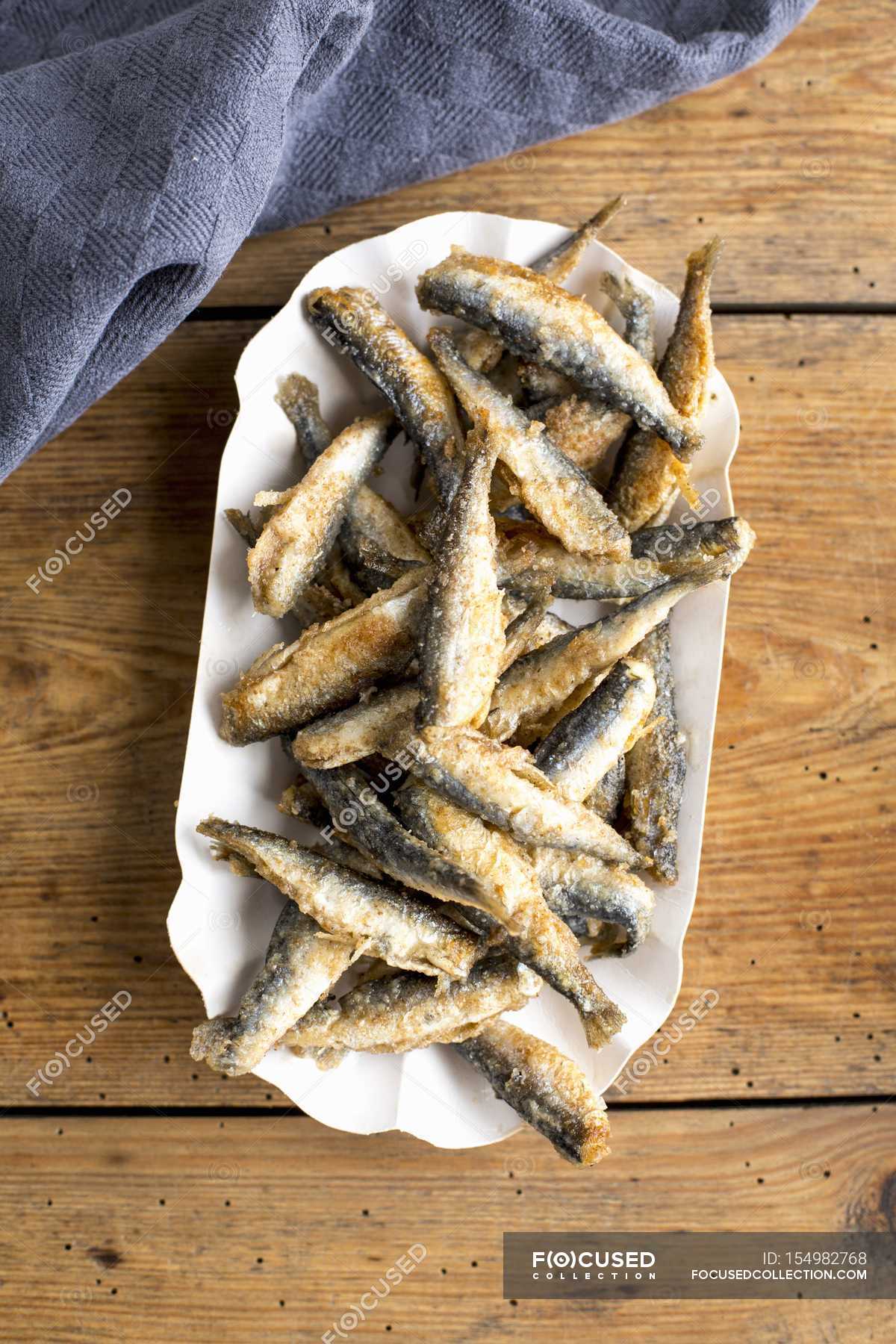 Plate Of Fried Smelt Fish Tasty Wooden Table Stock Photo 154982768