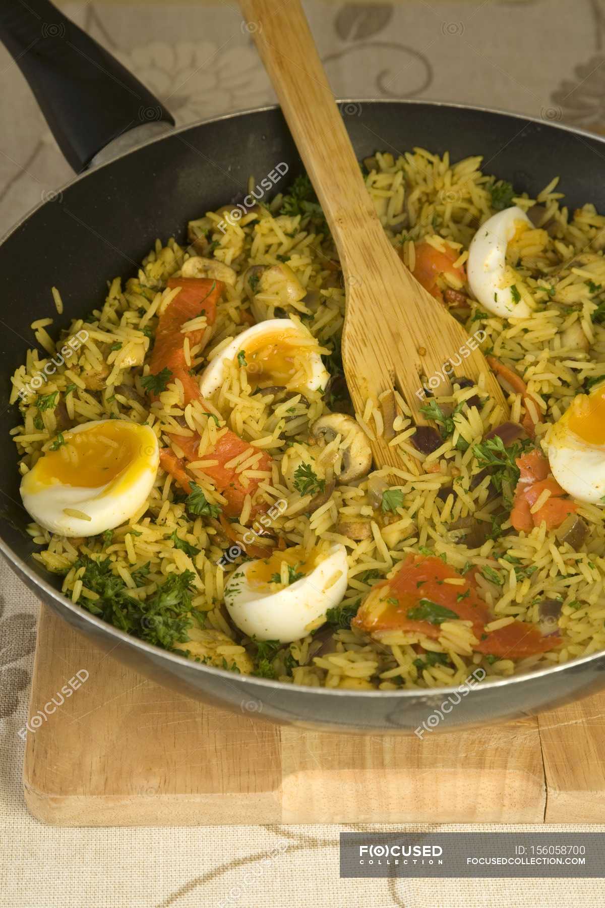 Smoked salmon kedgeree rice — eggs, food Stock Photo 156058700
