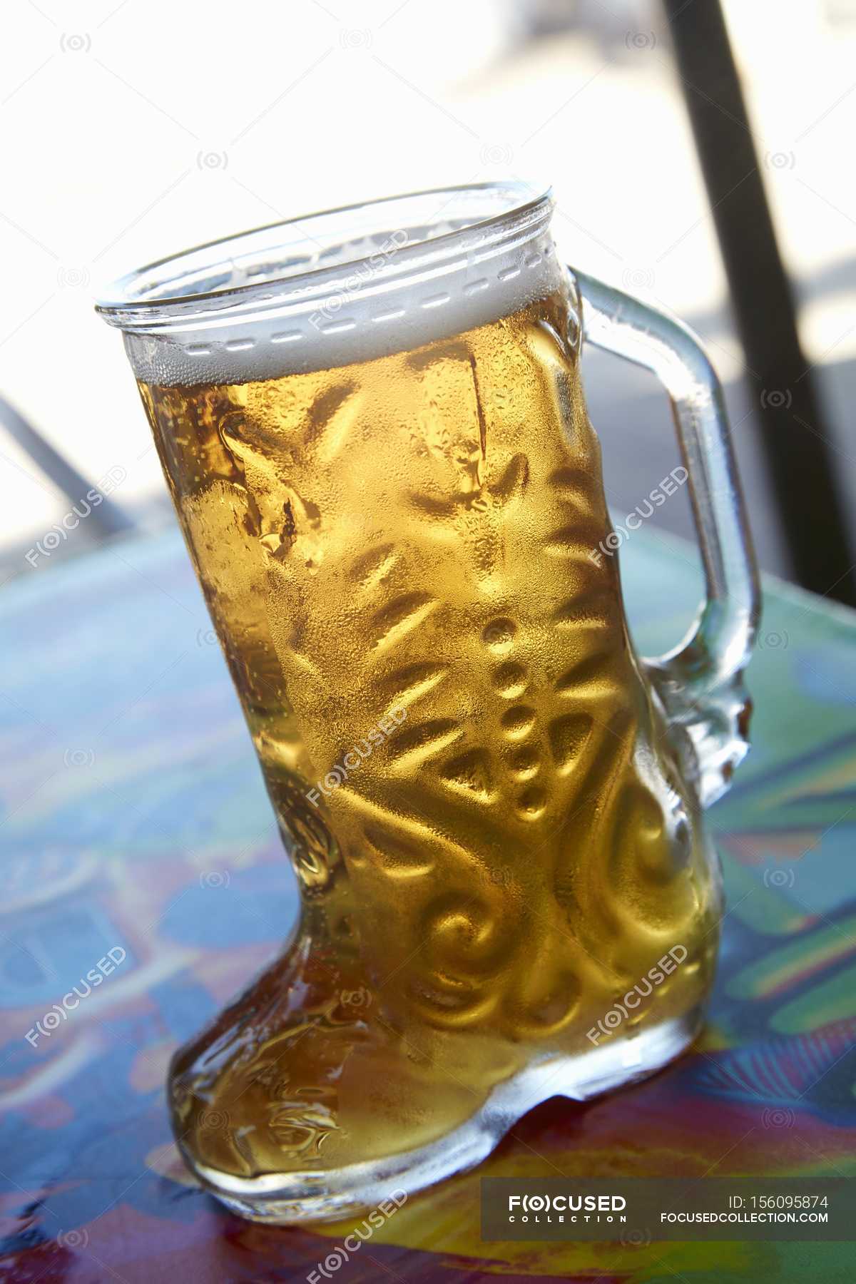 Beer in boot glass — Tasting, product Stock Photo 156095874 Beer in boot glass — Tasting, product Stock Photo 156095874