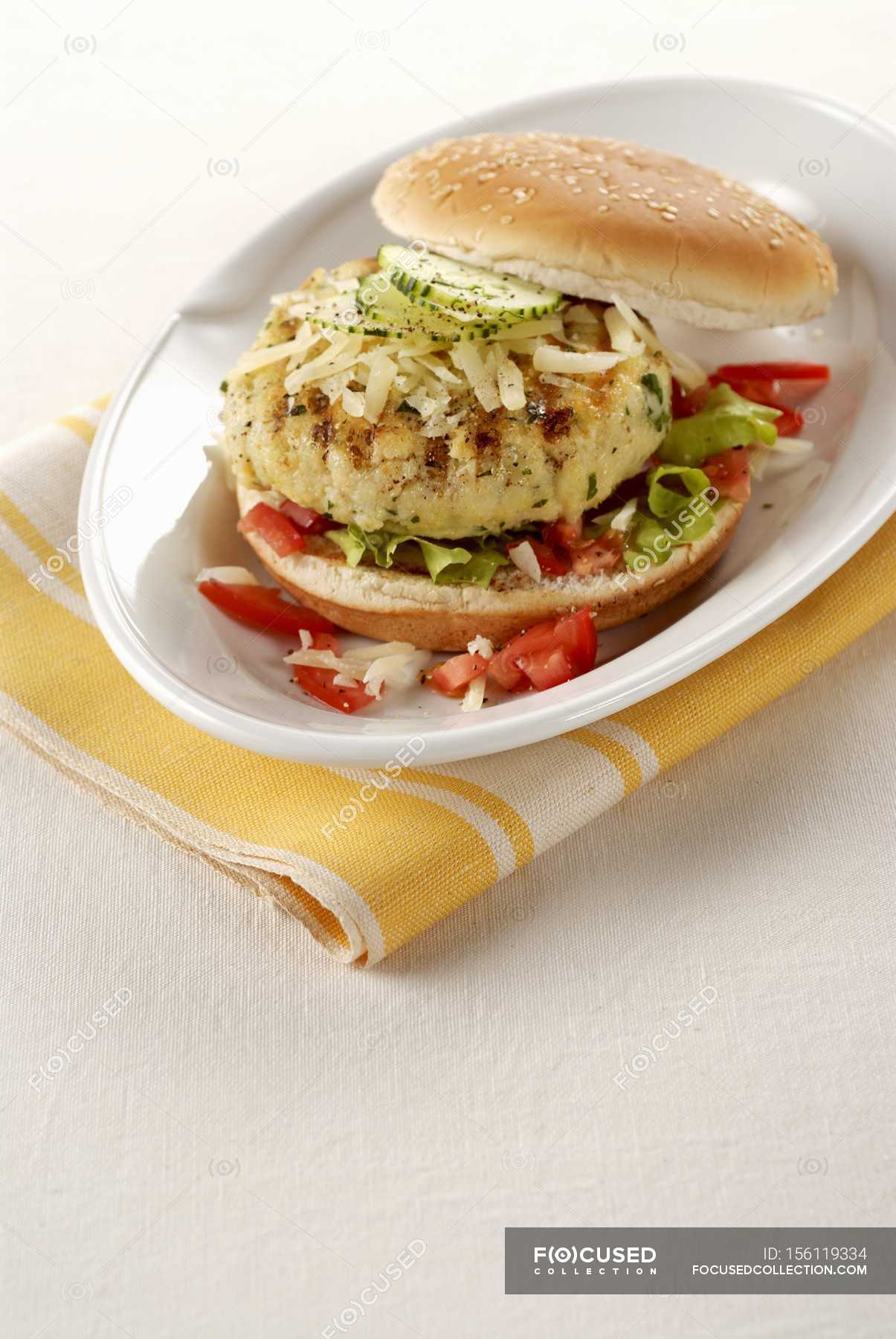 Fish burger with Emmental cheese — fast food, delicious Stock Photo