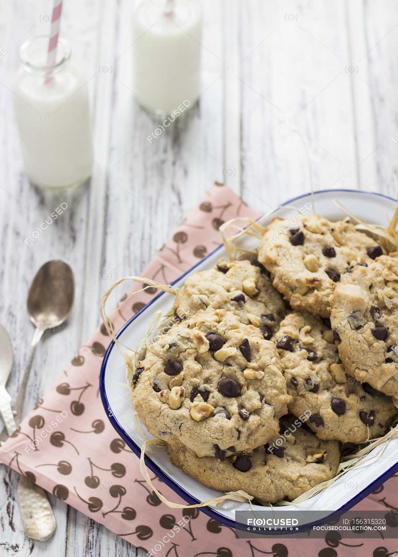 Chocolate chip cookies with chestnuts — milk, eating - Stock Photo ...