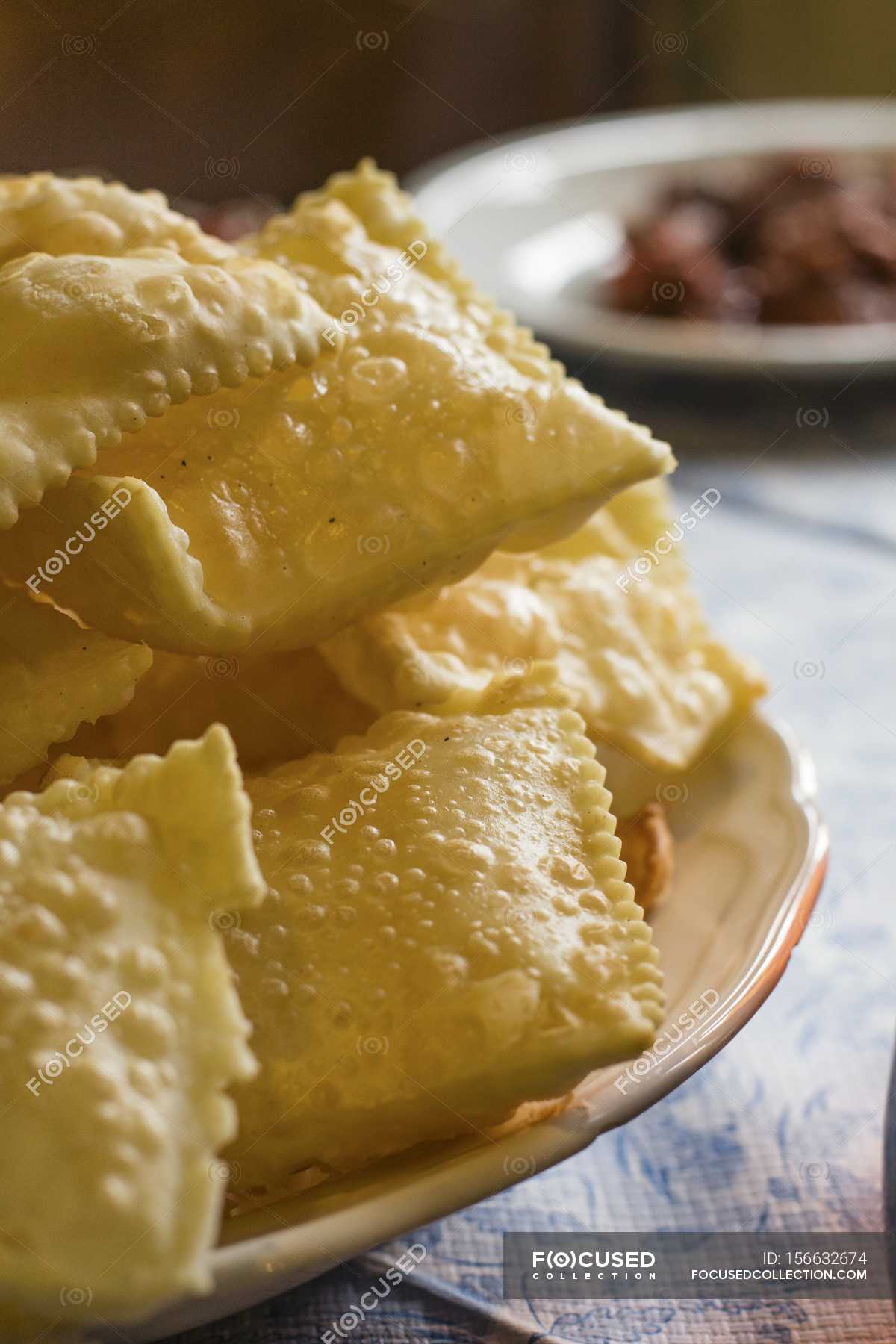 Closeup view of deep-fried pastries on plate — nutrition, nourishment ...