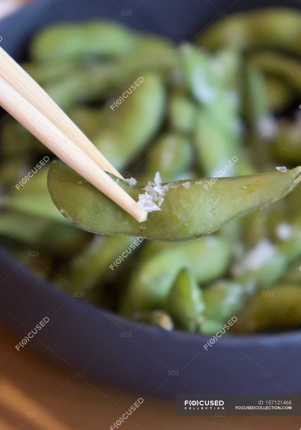 Steamed soybeans with salt — background, view Stock Photo 157121466