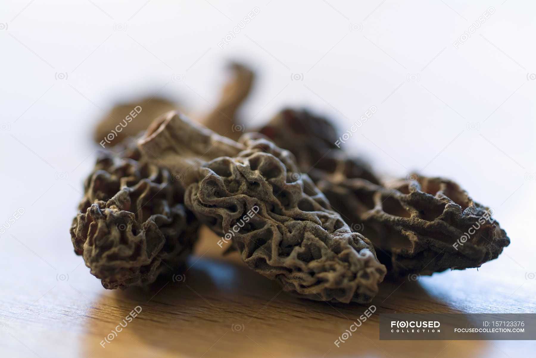 Dried morel mushrooms — unprocessed, eating - Stock Photo | #157123376