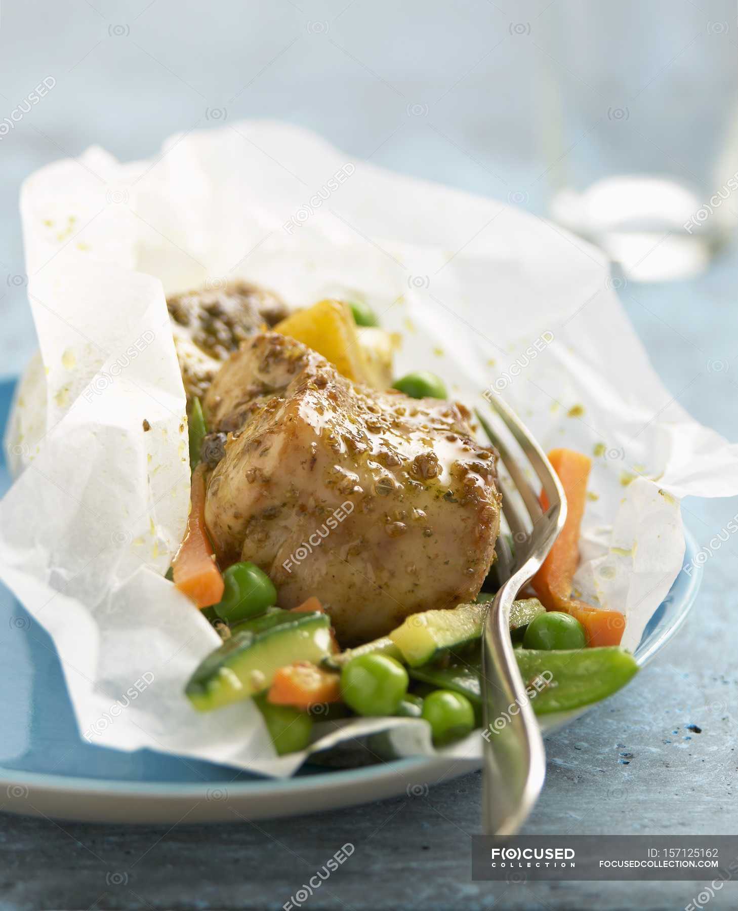 Rabbit with coriander in paper — wax, over Stock Photo 157125162