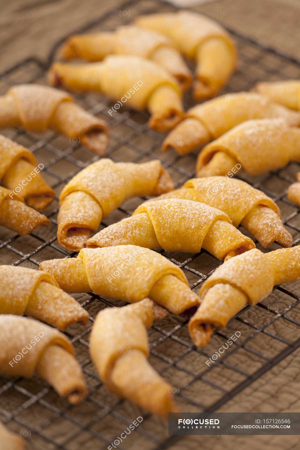 Rolled cookies with rose jam — baking, recipe Stock Photo 157126546